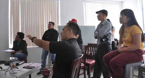 Left to right: Grace, Tommy, Tam, Cuong, Joan. Everyone was focused and attentive to the presentation;&nbsp;Tam discussed the details within the creativity. (Photo: Carolyn)