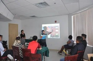 Hung Vu explaining to the Committee the dimensions of the available wall space. (Photo: Kevin Lam)