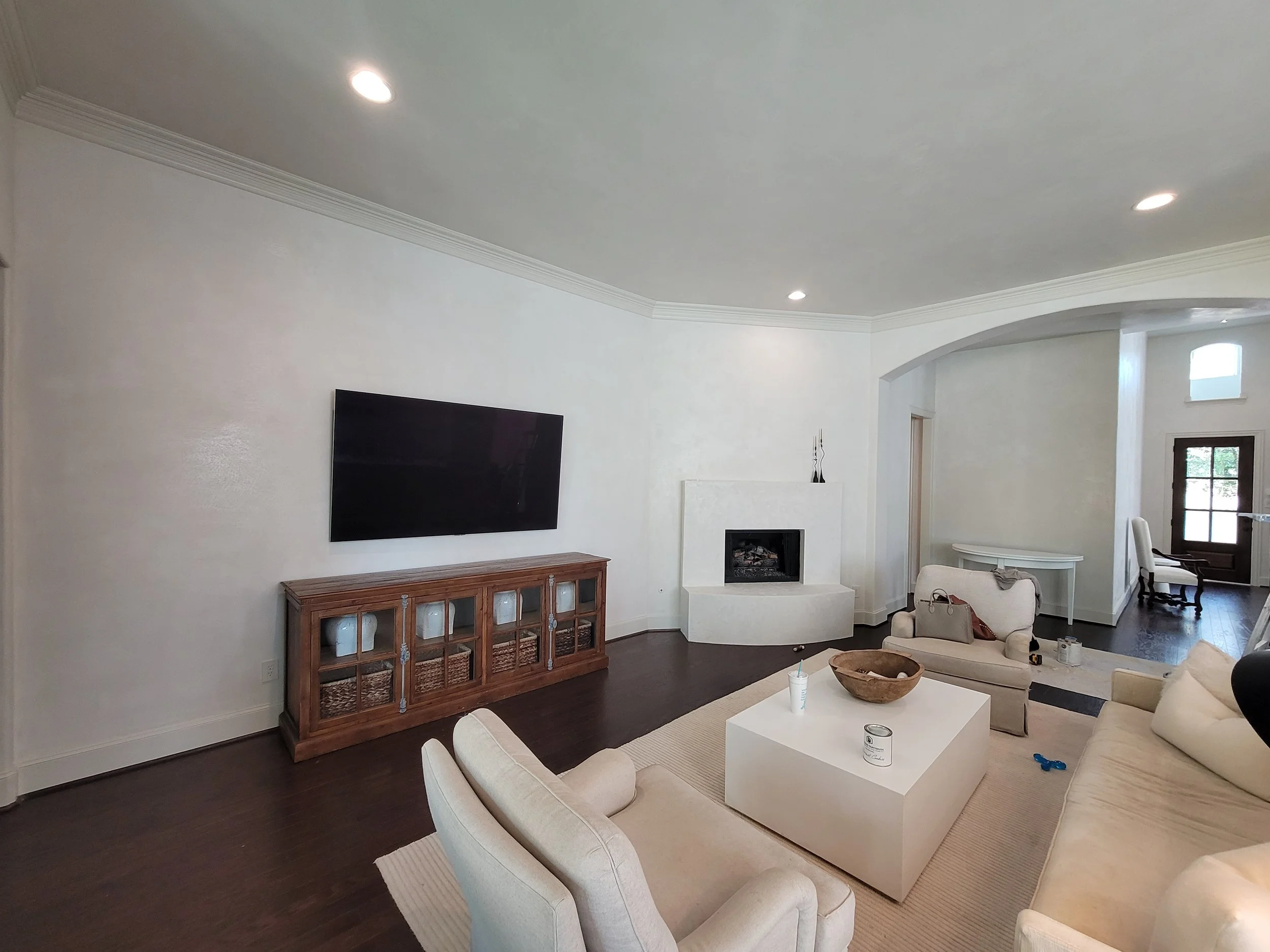 Color drenched gray interior with walls, ceiling, and trim painted the same color in Missouri City, Texas.
