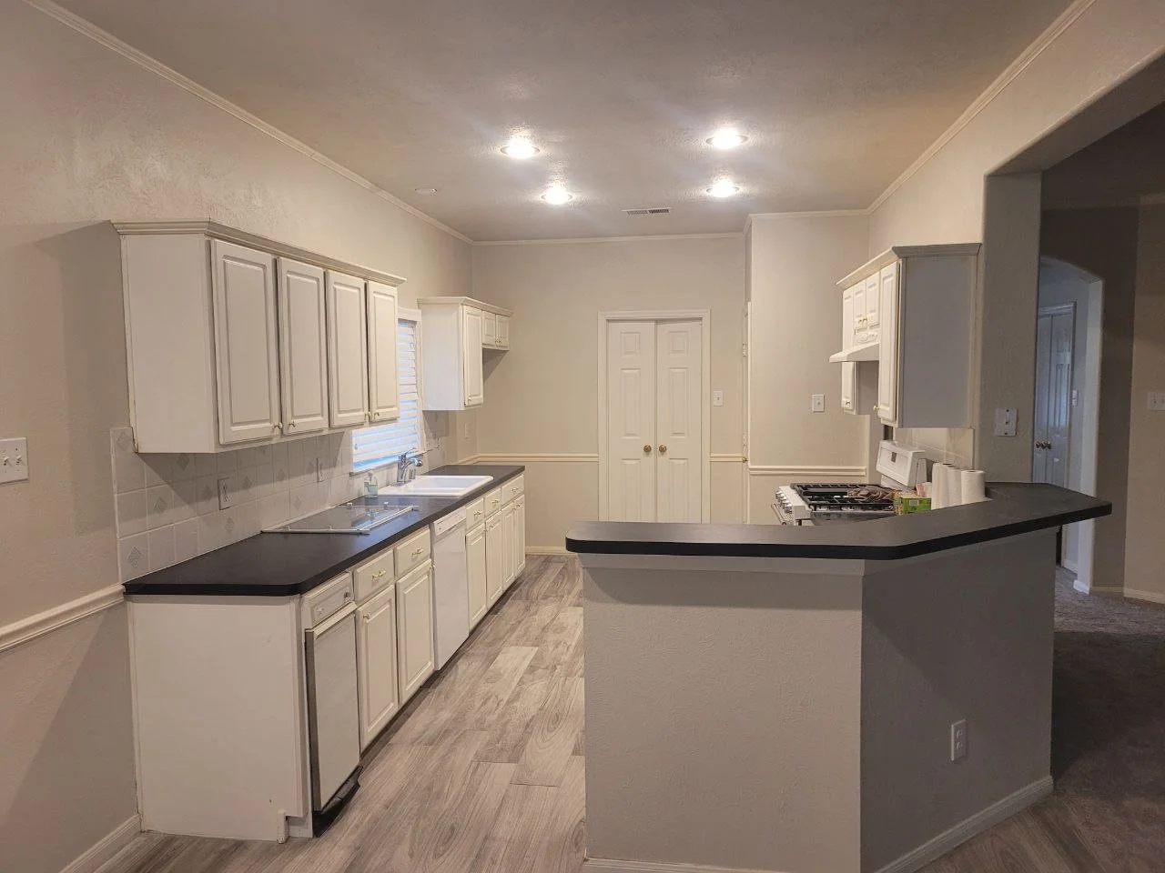 Freshly painted small kitchen cabinets in Sugar Land, Texas