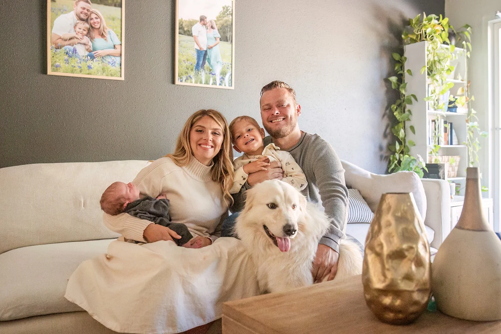 Chris Petkau, owner of The Proud Paintbrush, with his wife Sarah, their two sons, and their dog in Sugar Land, Texas.