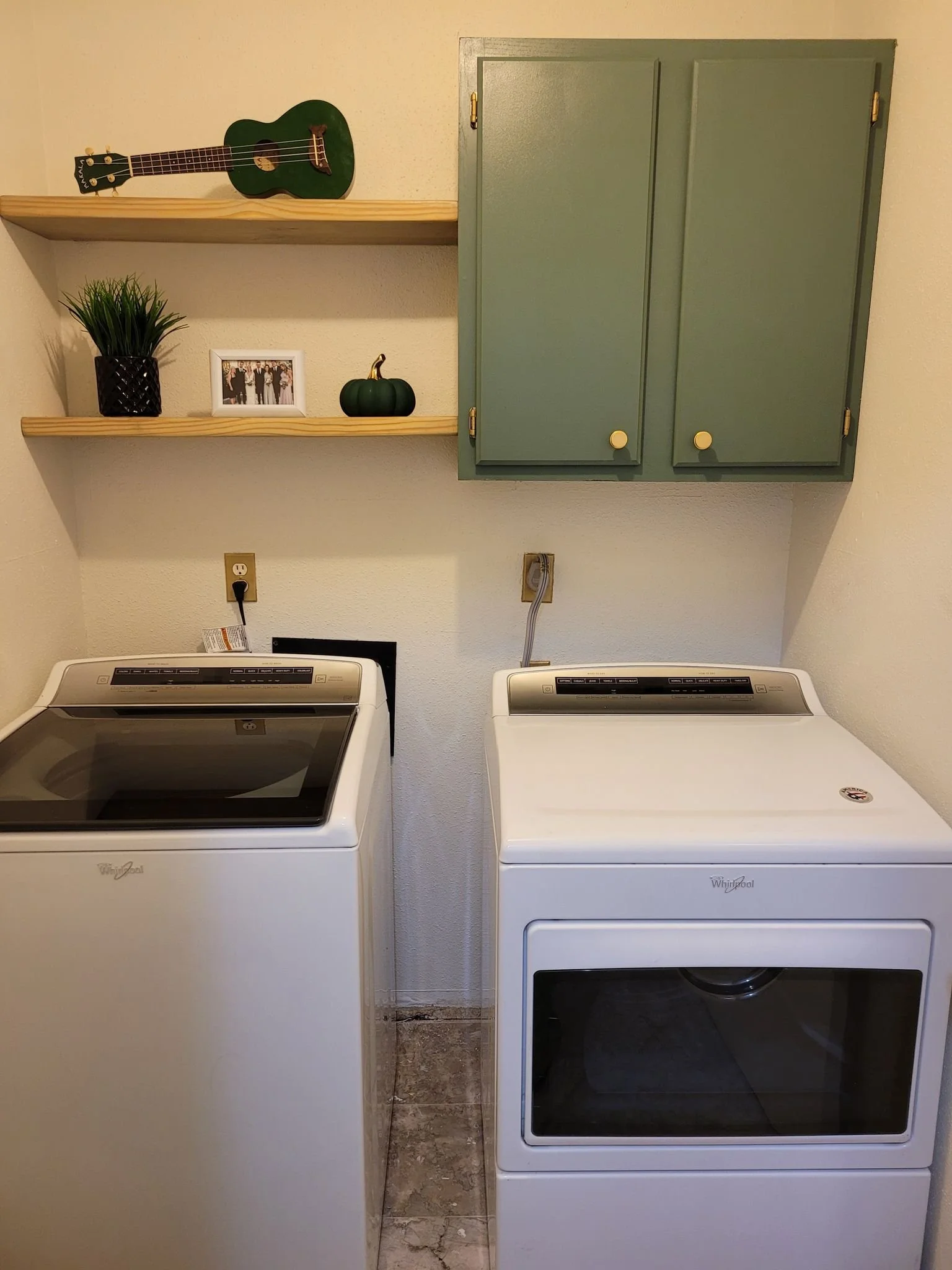 Freshly painted spacious laundry room in Richmond Texas with functional layout