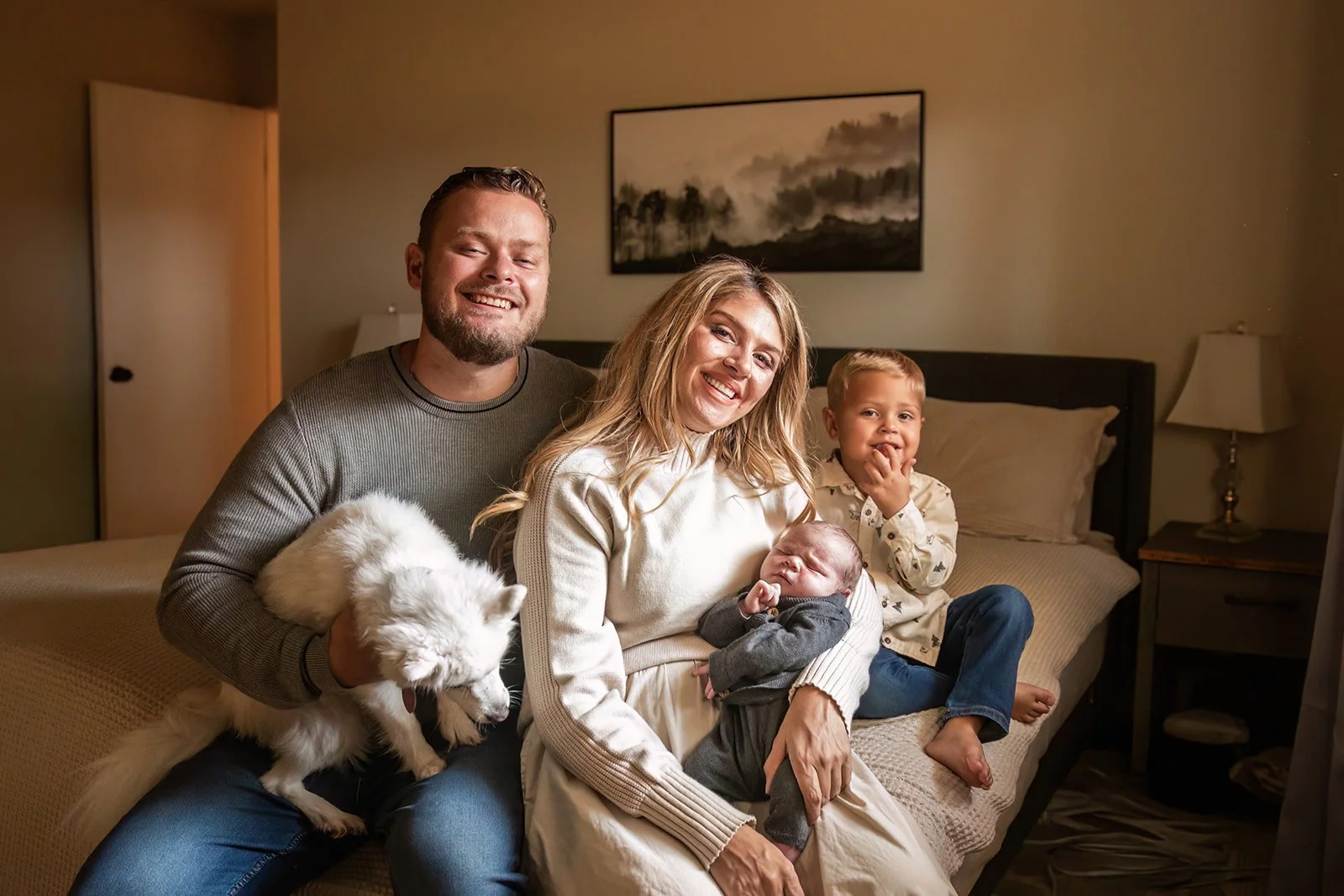 Chris Petkau with his wife Sarah, their two sons, and their dog in Sugar Land, Texas.