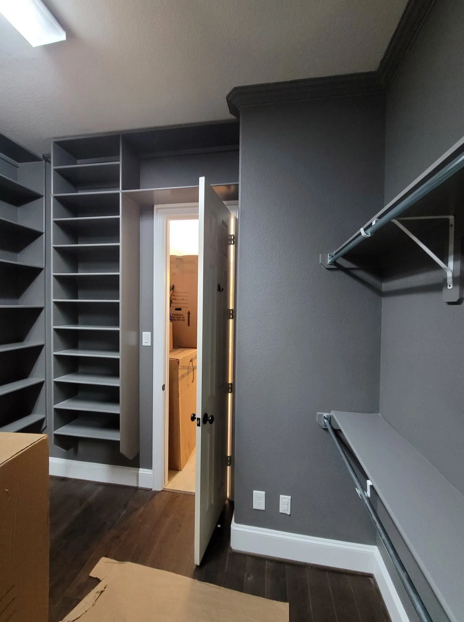 Painted custom bedroom storage shelves in Sugar Land Texas with modern finish