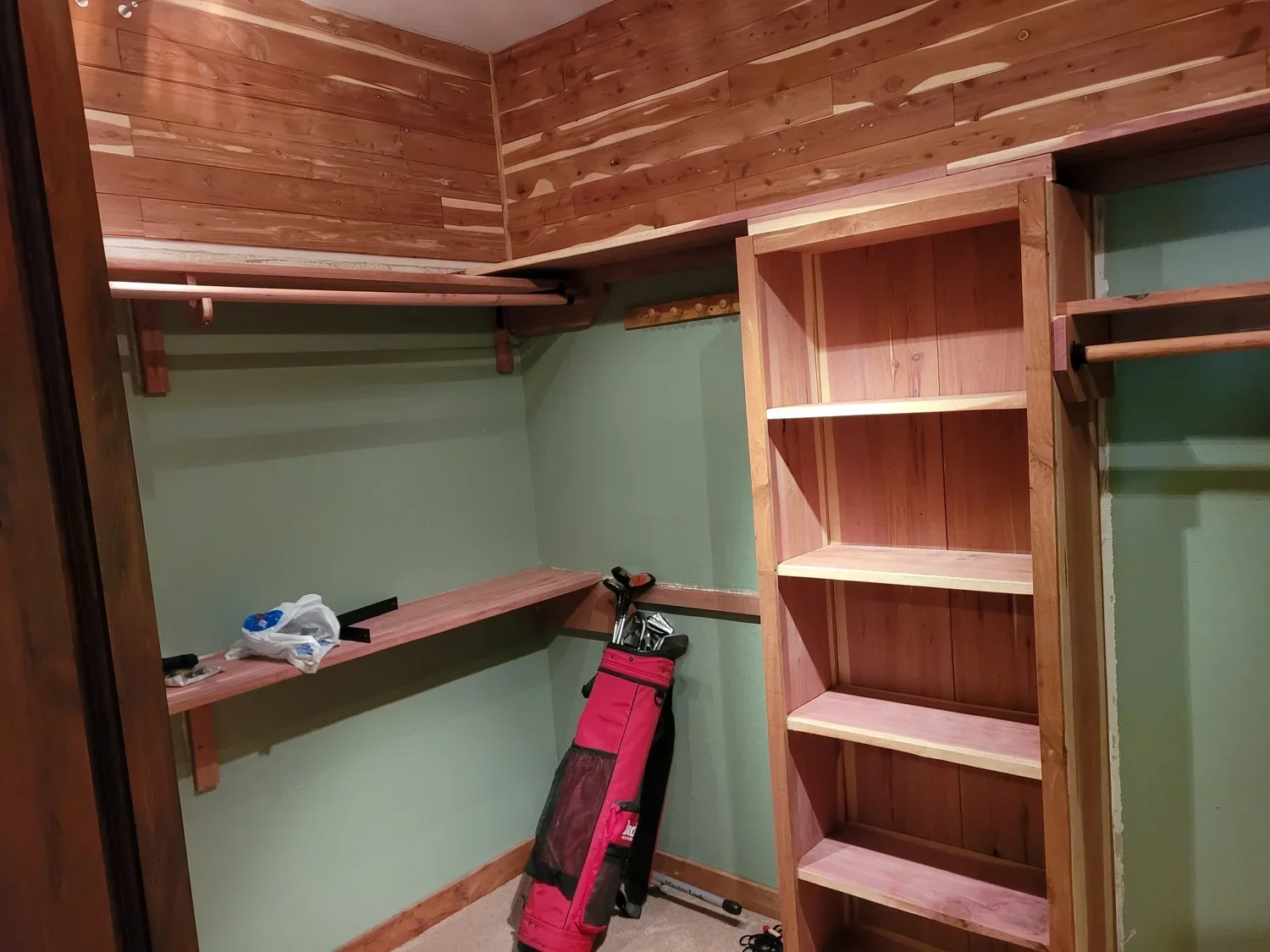 finish-carpentry-cedar-closet-shelving-stained-sugar-land.webp