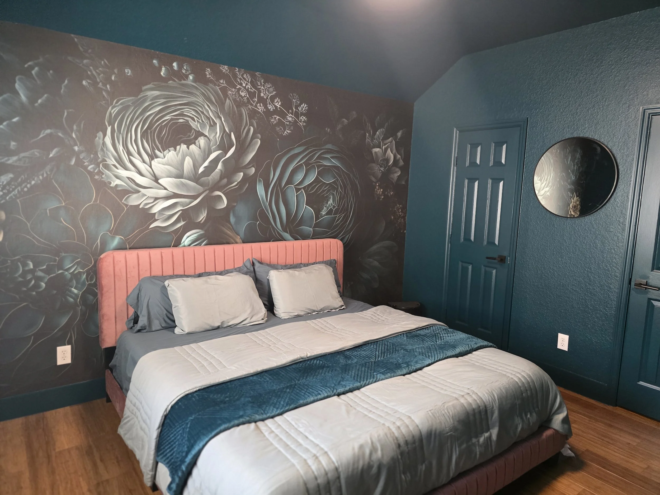 Color-drenched dark green bedroom with wallpaper in Sugar Land, Texas