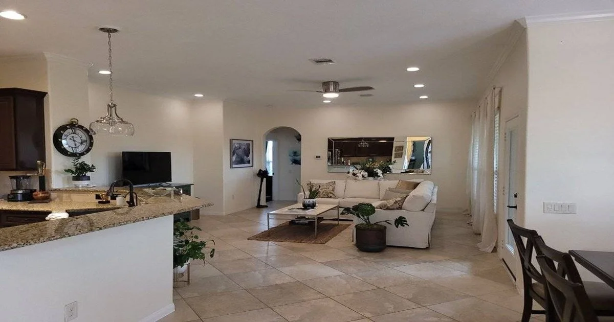 Freshly painted living room and kitchen with a clean modern finish in Fulshear, Texas