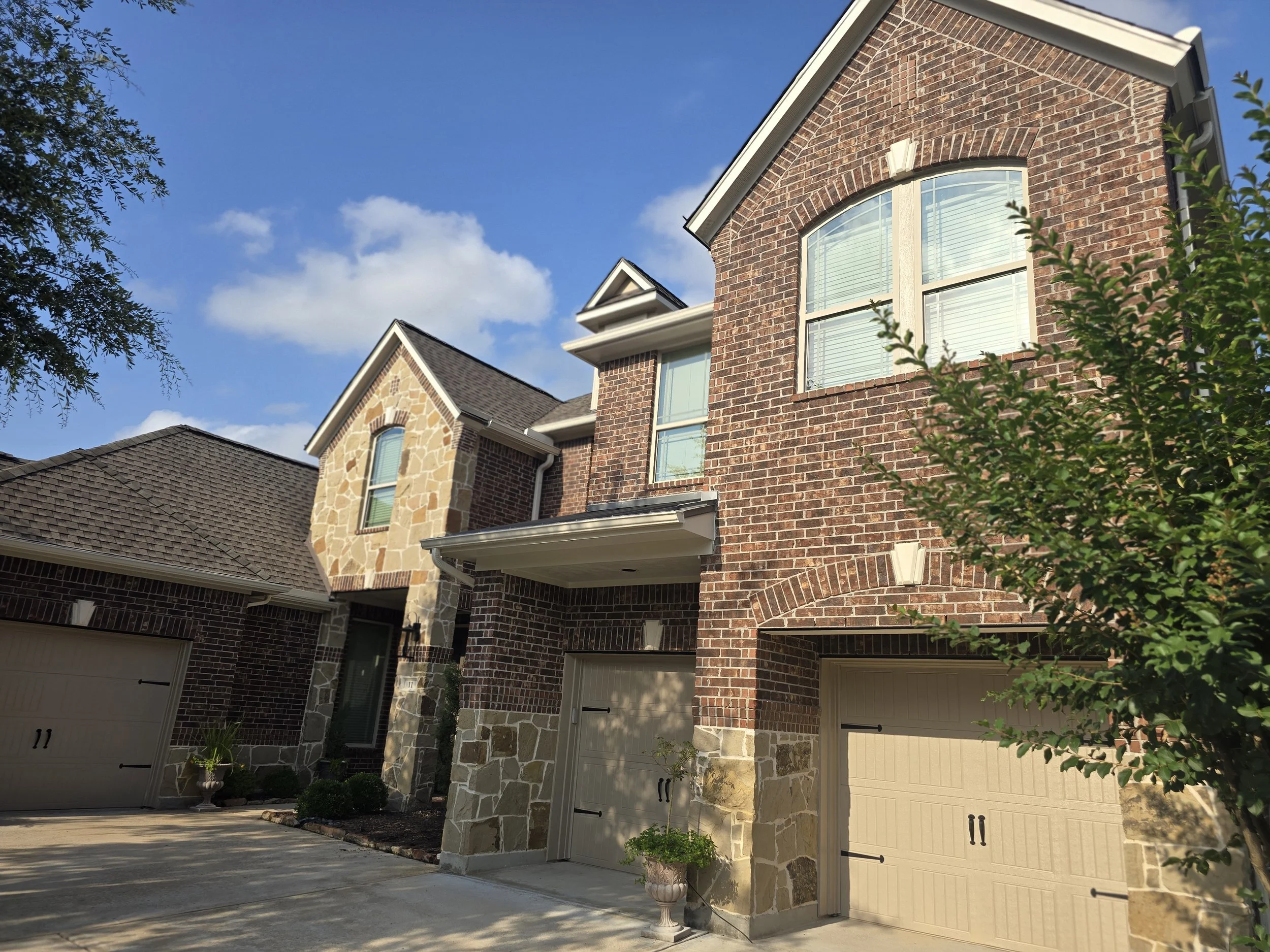 Brick exterior home in Missouri City prepared and painted by professional residential painters