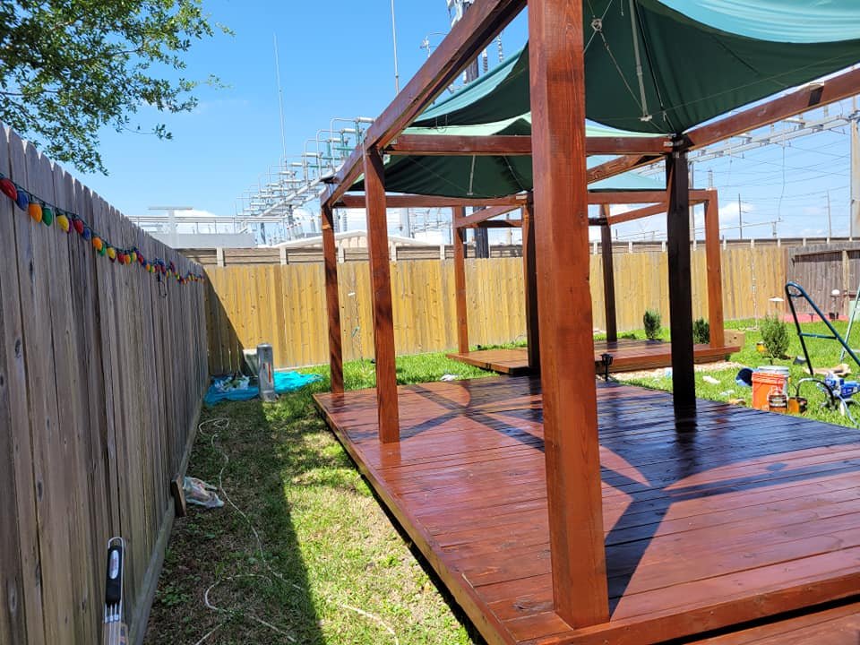 Exterior painting on pergola with smooth finish in Richmond home.