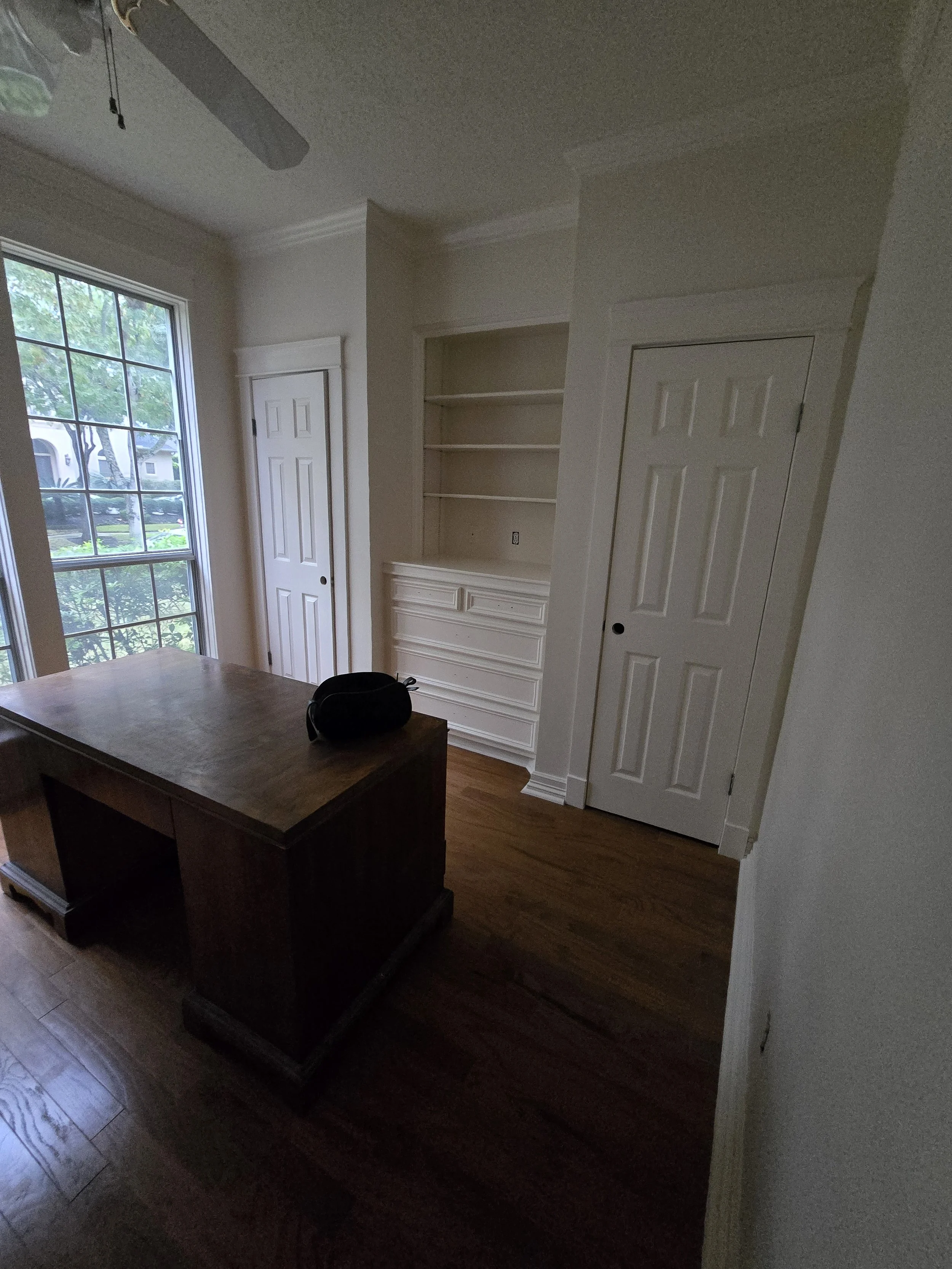 Newly painted modern bedroom interior in Missouri City TX with open layout