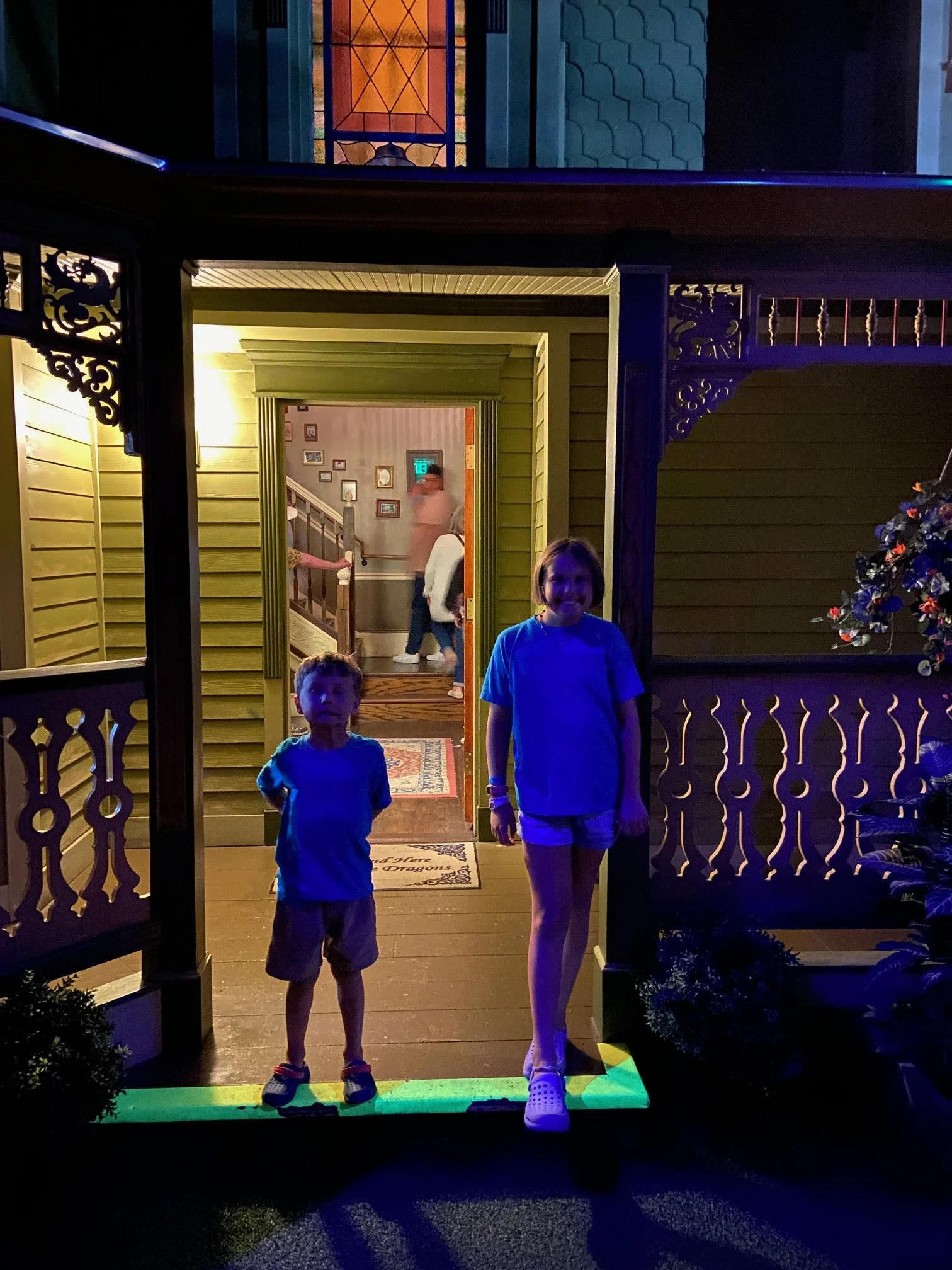 On the farmhouse's front porch