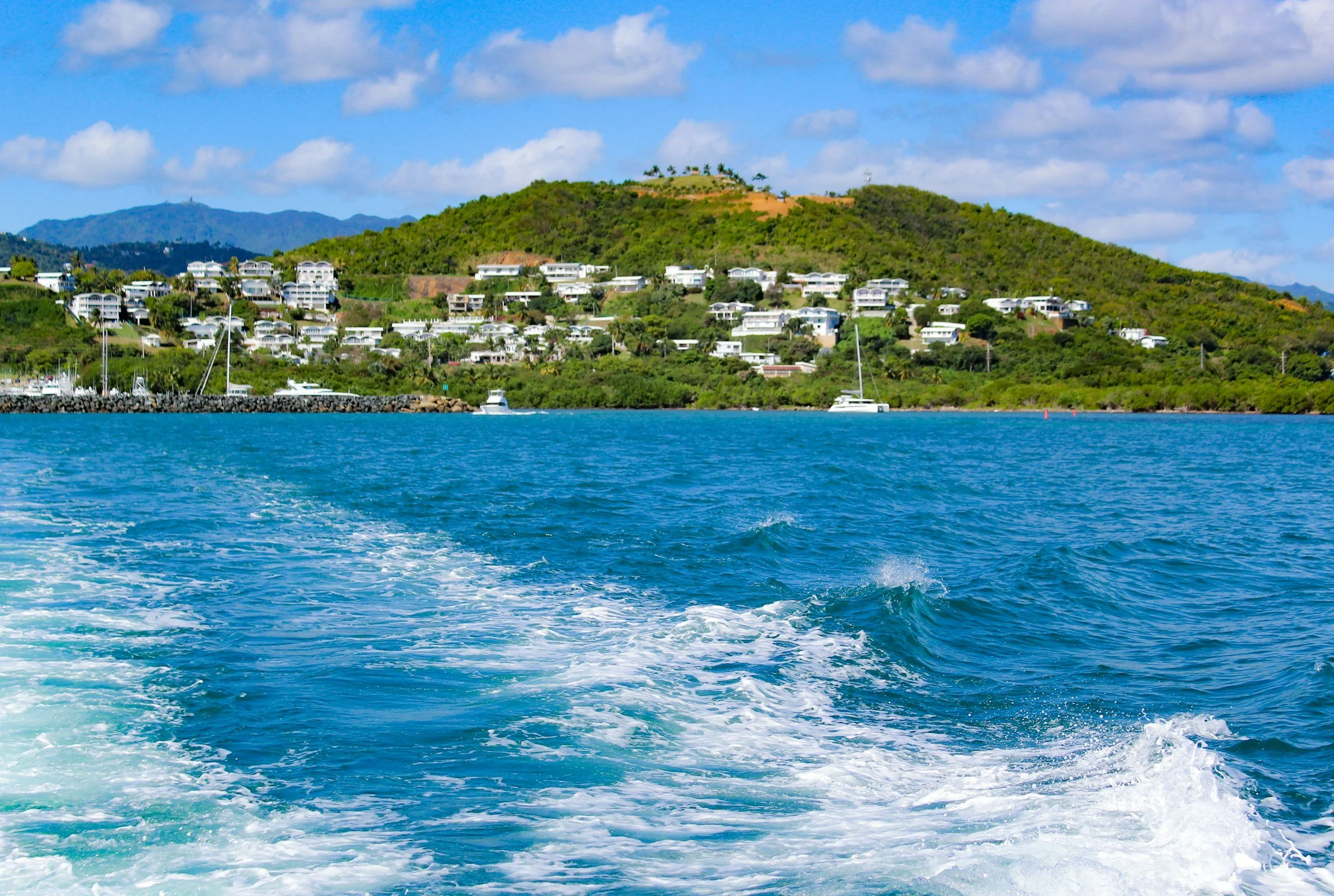 Houses and hotels speckled on the hillsides of Fajardo