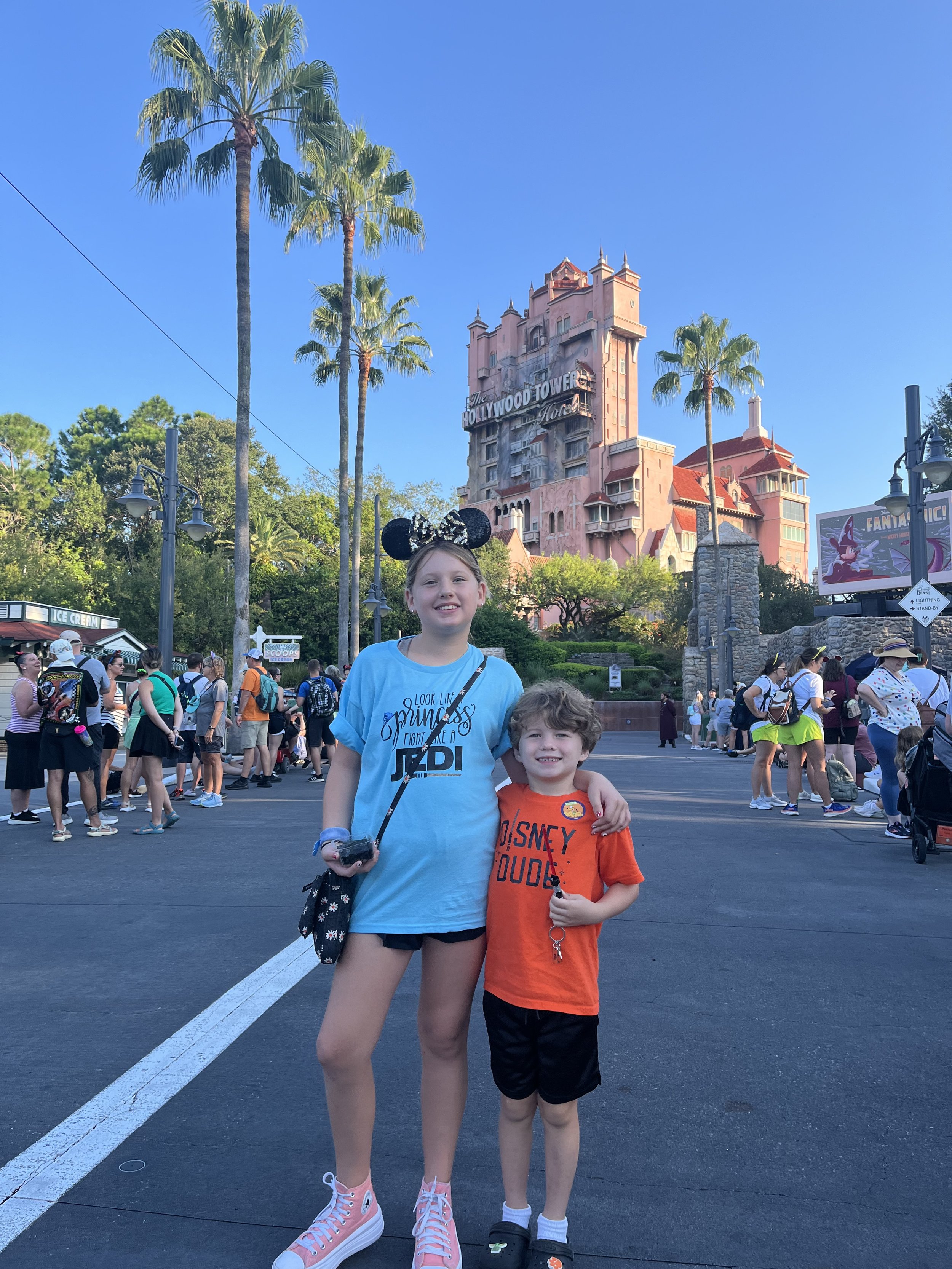 The author's children stand in front of the Hollywood Tower Hotel in Disney's Hollywood Studios theme park