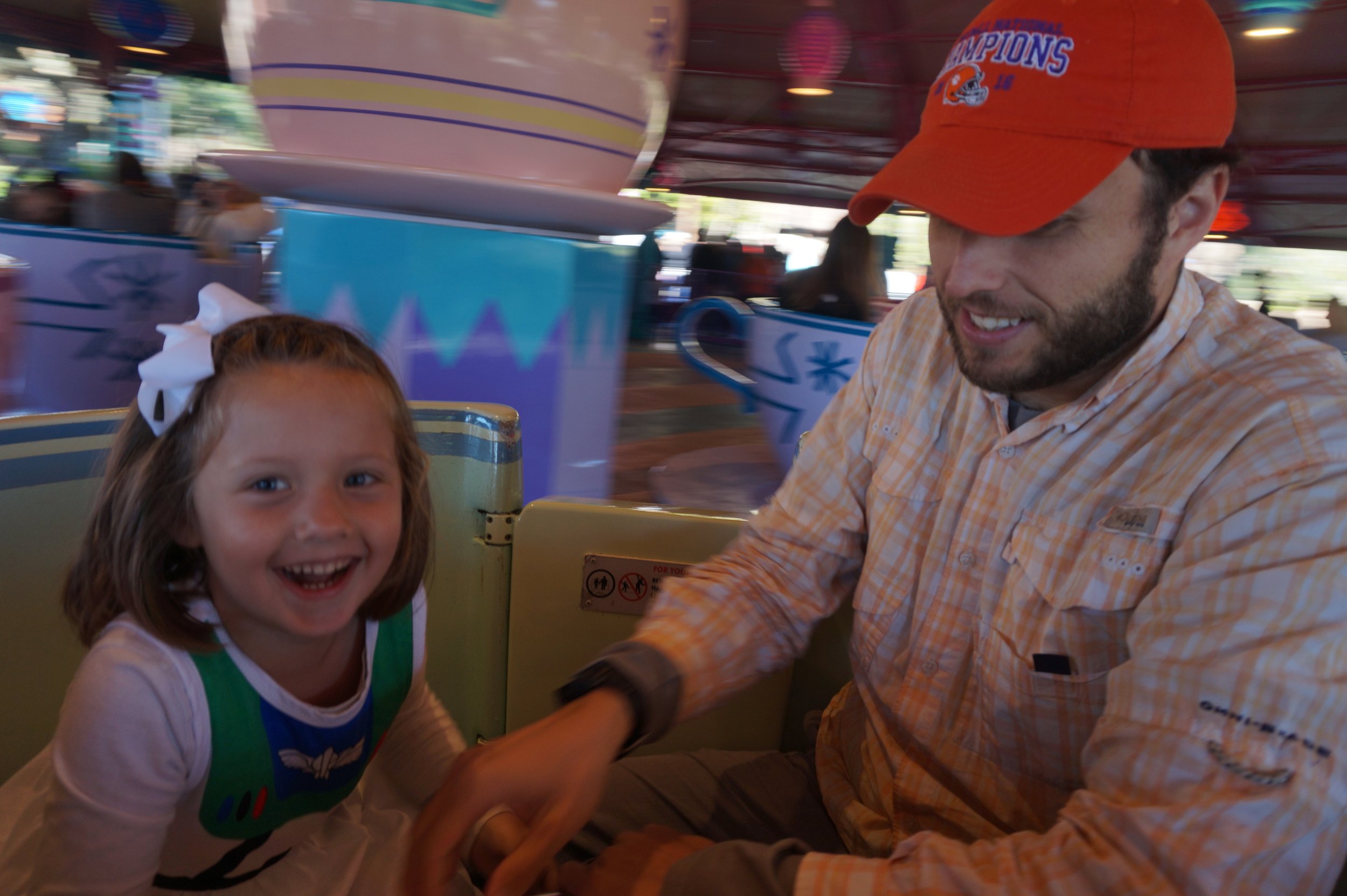 The author's daughter and husband on a ride in Magic Kingdom at Walt Disney World