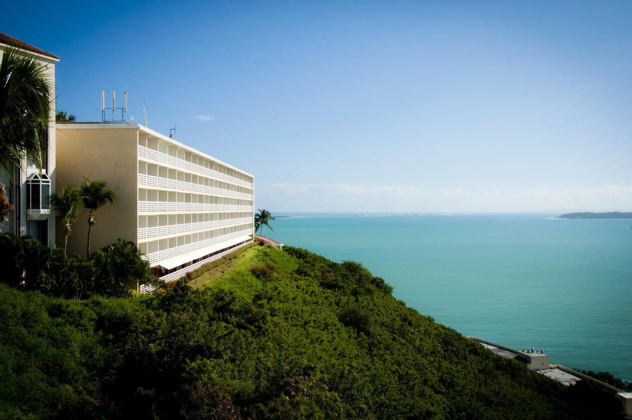 Las Brisas Wing of the El Conquistador Resort with the bright blue Caribbean below