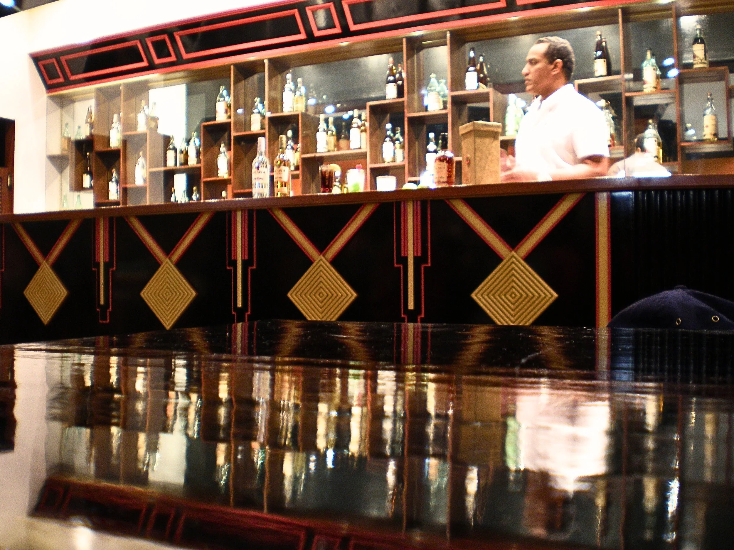 Tour guide at the Bacardi Factory making a Cuba Libre