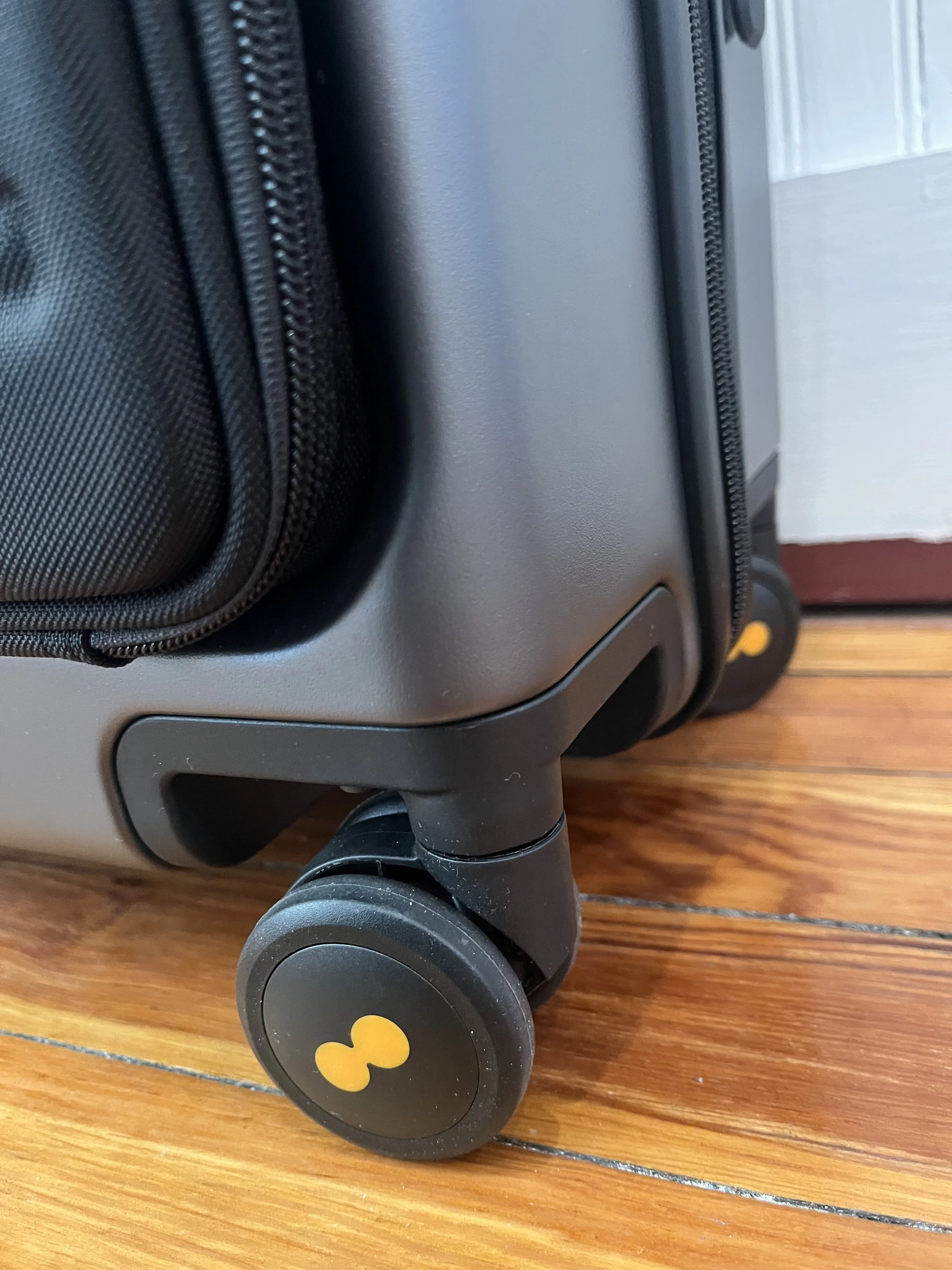 Close up of the spinner wheels on the Creator suitcase
