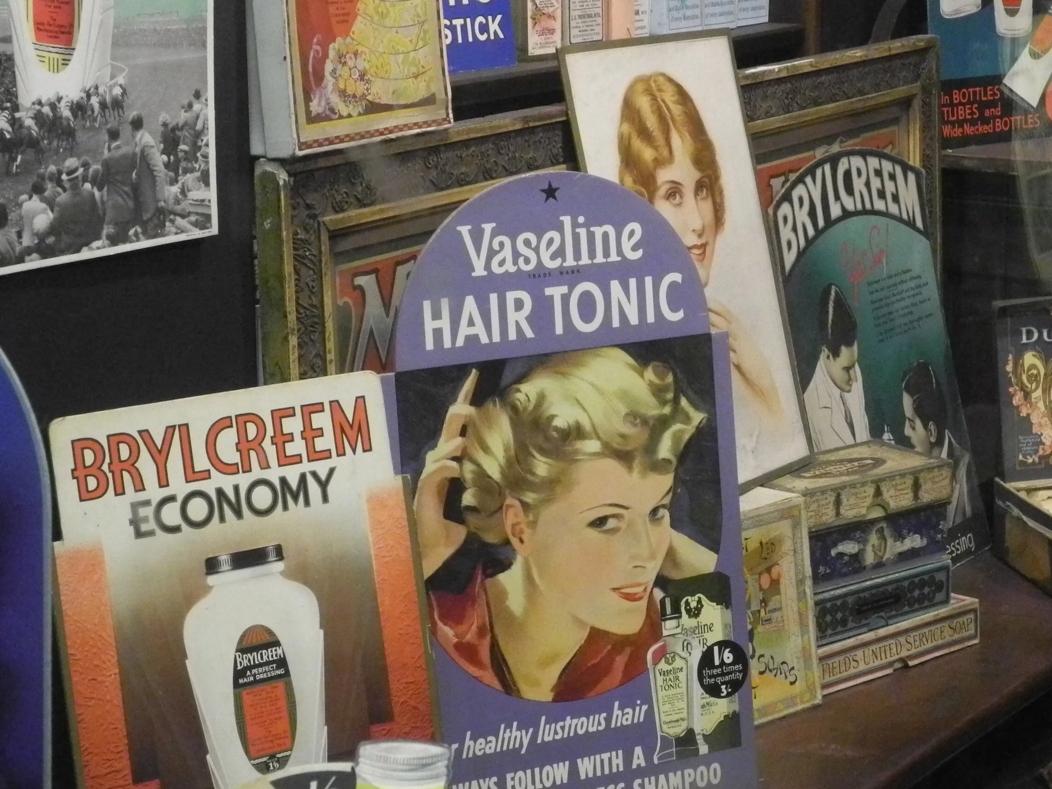 Old advertisements for hair cream in the Museum of Brands