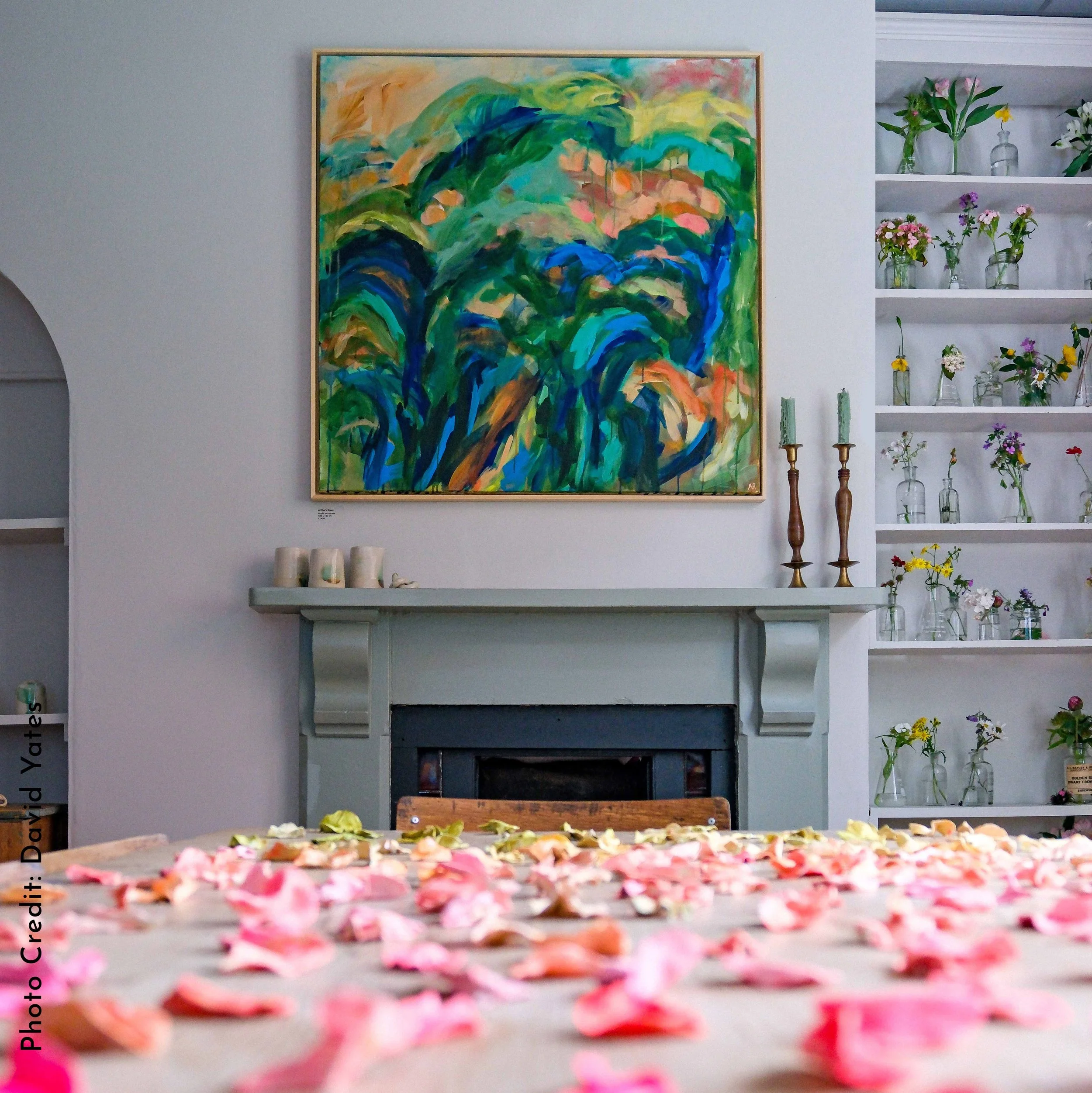 Abstract floral painting, blues and greens and peaches. hanging above a fireplace at Swan Hill Studios, Shrewsbury
