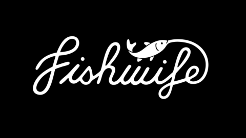 The word "fishwife" written in cursive white font with a small fish illustration above the letter 'i' on a black background.