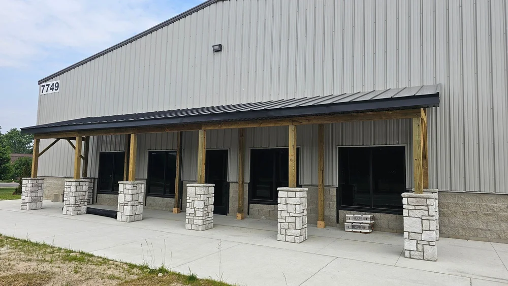 Newly built flex space at 7749 East M-36 fronting a wide concrete parking lot