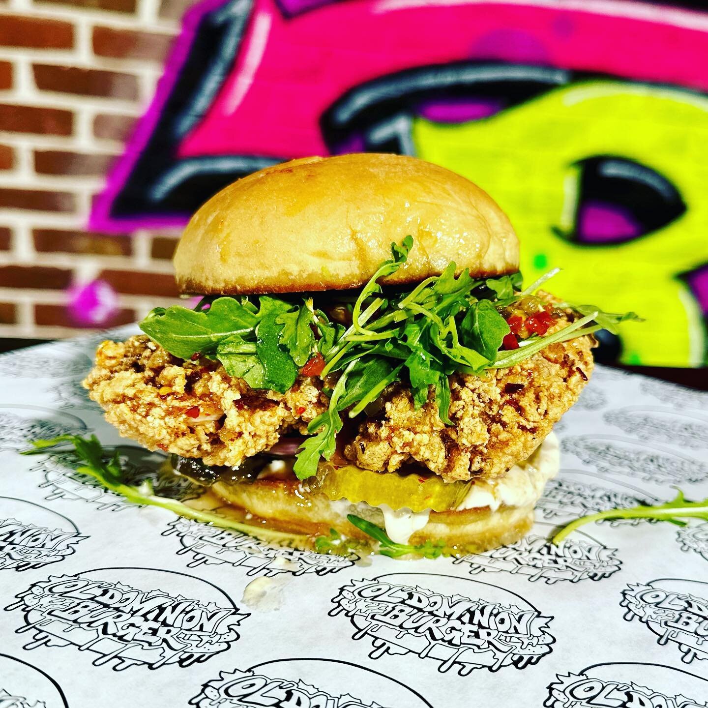 The Honey Bird is our newest chicken sandwich!
 
This marinated chicken thigh is fried and then tossed in hot honey. Served on a potato bun with goat cheese, pickled red onion, pepper relish, and arugula.