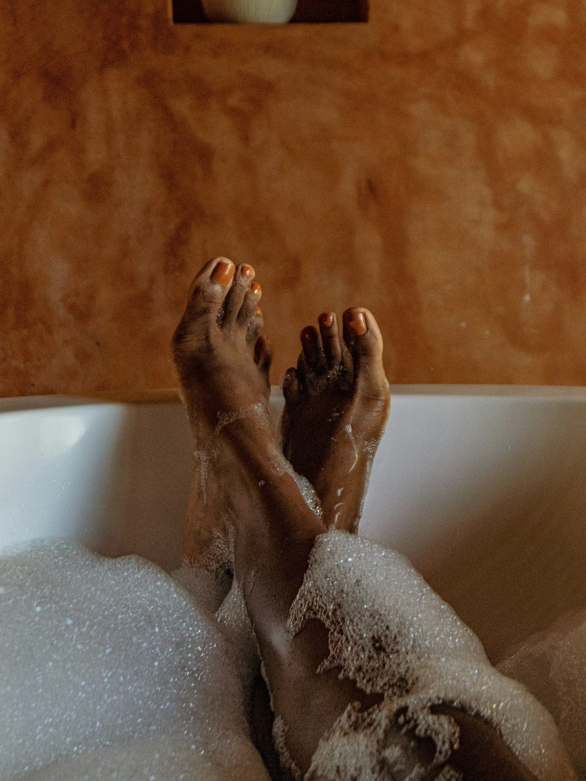 Relaxing bubble bath representing stress relief, relaxation, and intentional self-care.