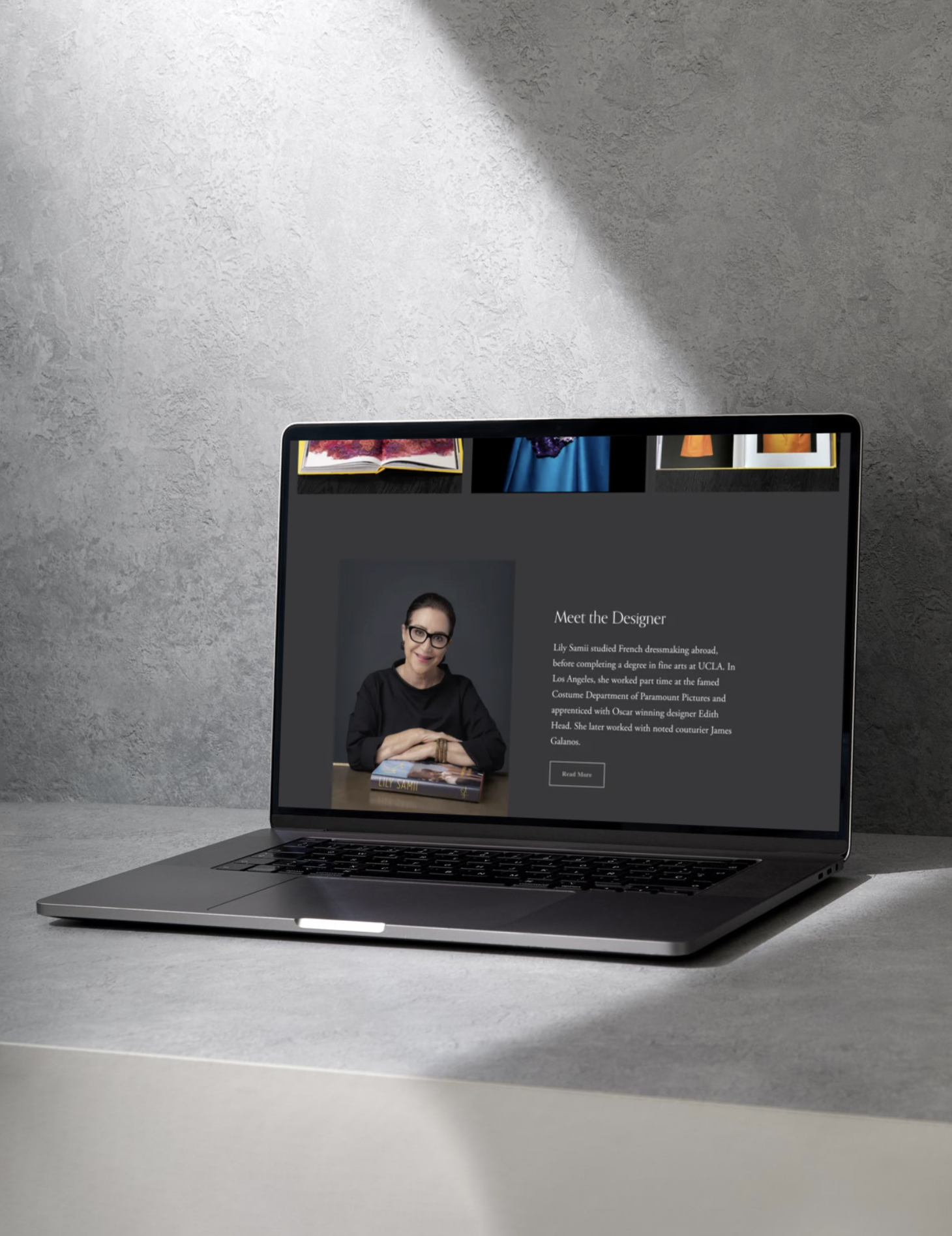Laptop open with Lily Samii homepage about section
