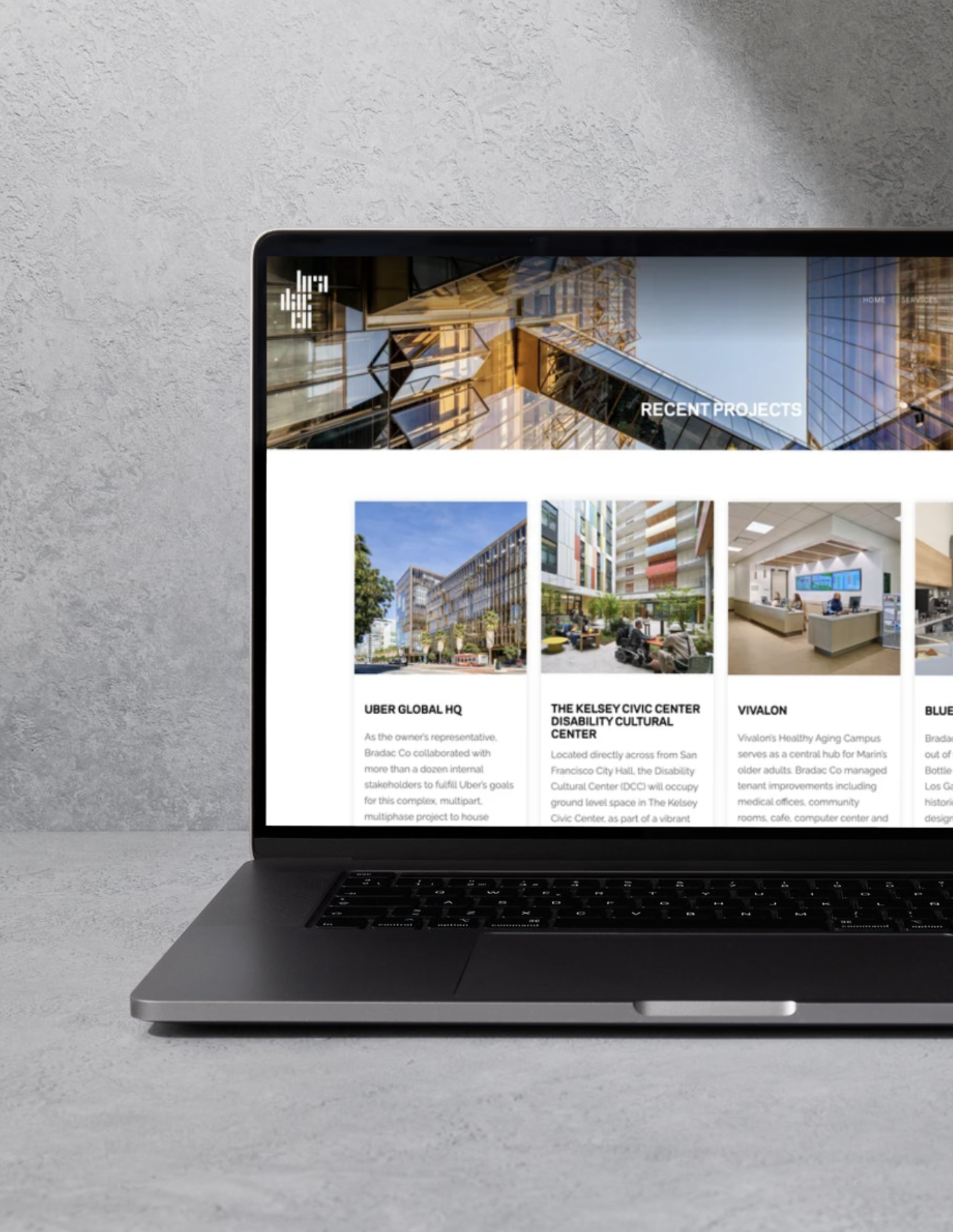 Laptop with Bradac Co projects page open