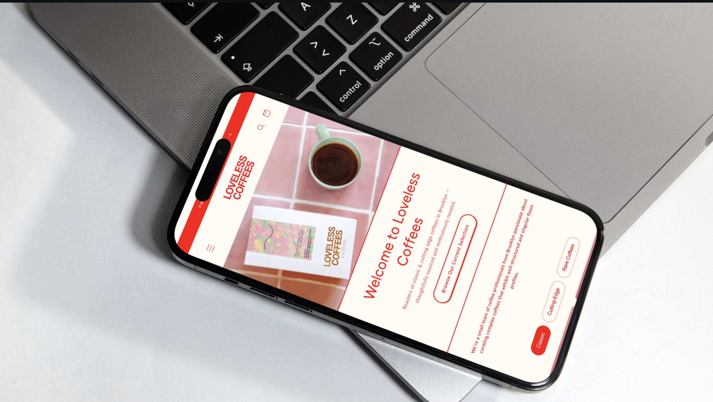 iPhone with Loveless Coffees homepage open