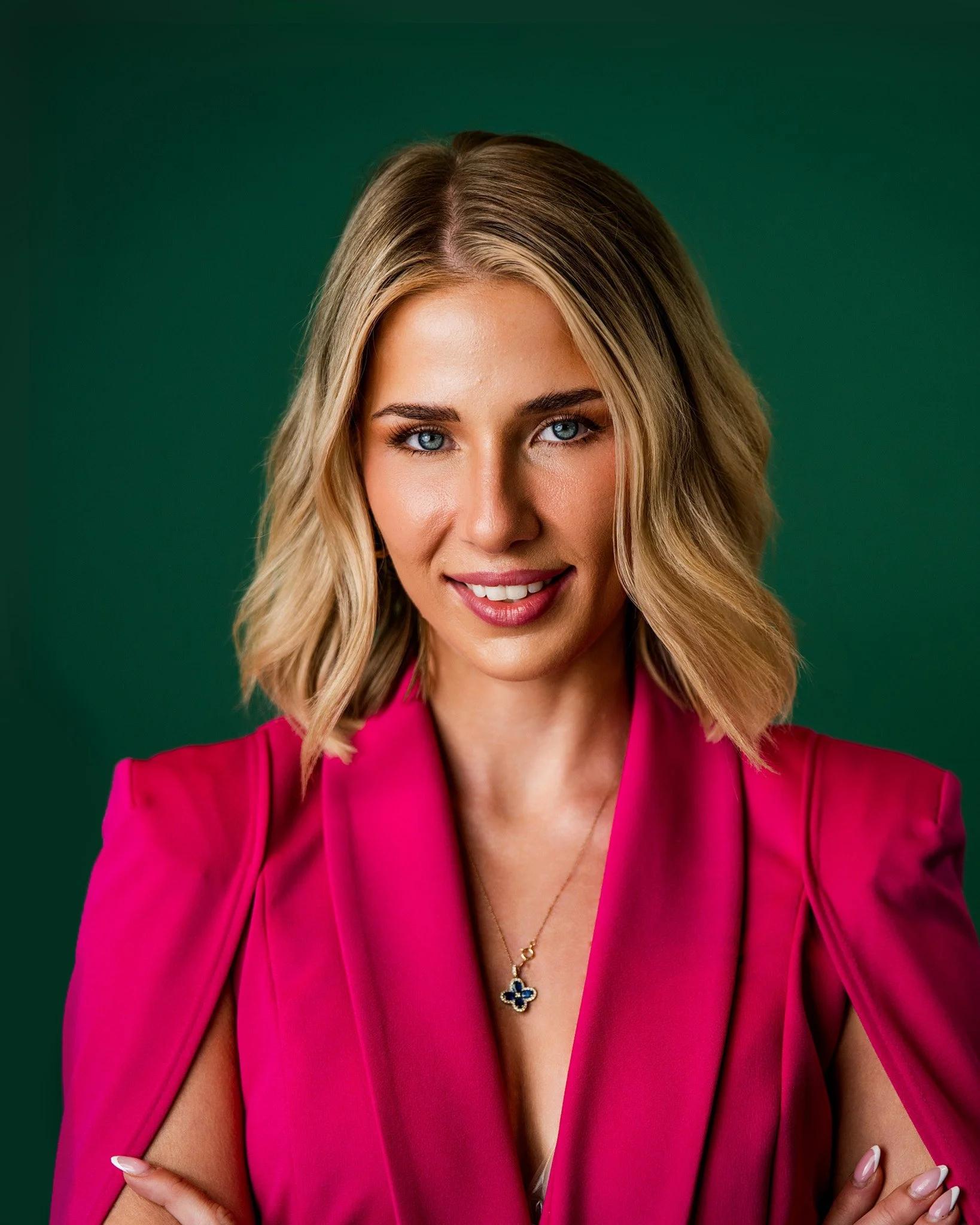 Pink Serious Headshot.jpg