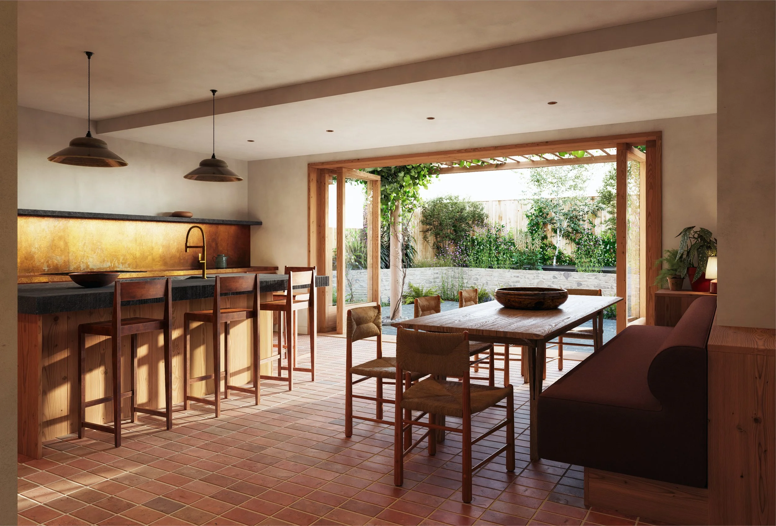 Interior of a modern kitchen and dining area with a view of a garden outside, featuring wooden furniture, a dining table, chairs, bar stools, pendant lights, and large sliding doors opening to an outdoor patio.