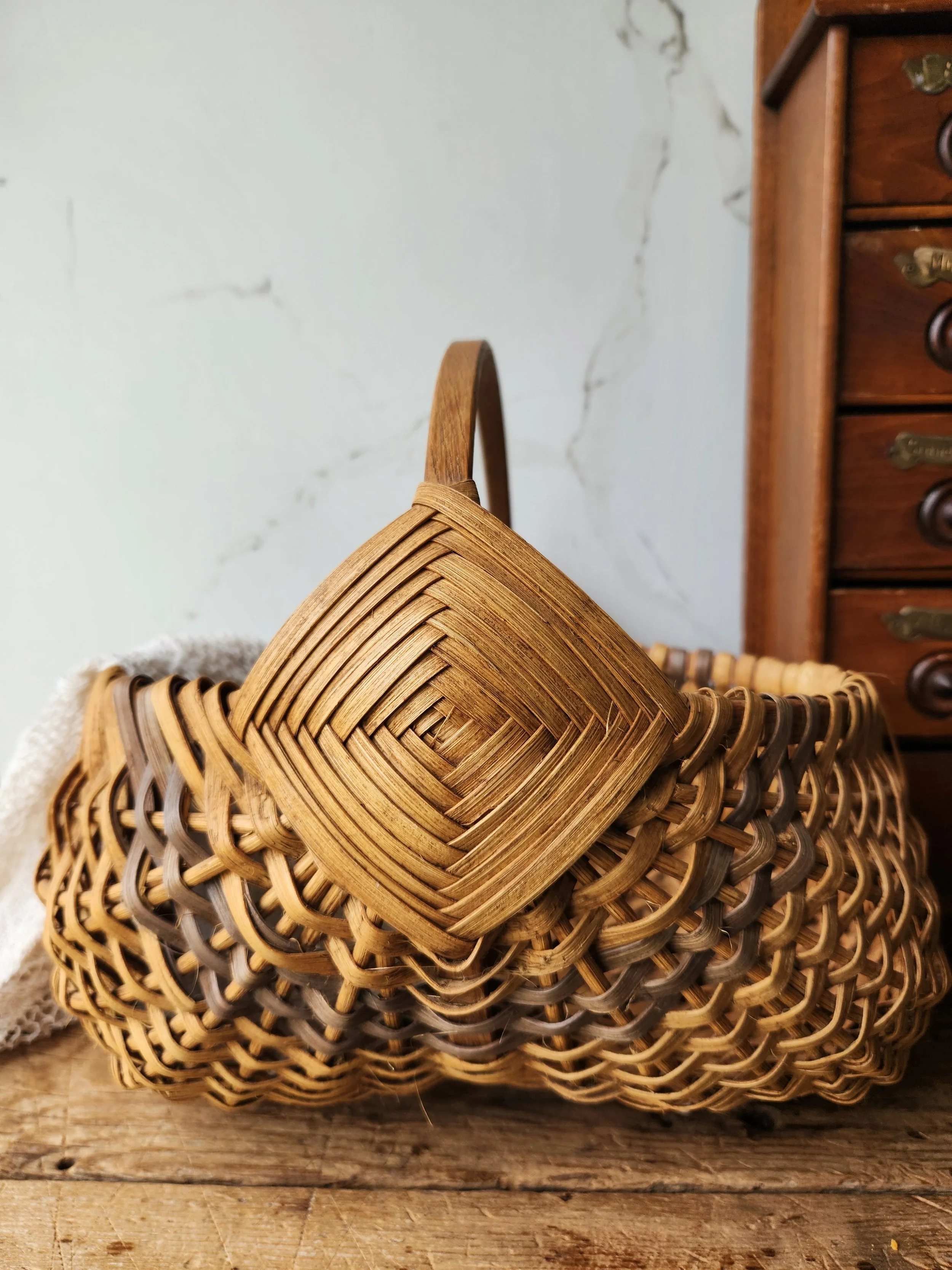 Antique hand woven Buttocks basket