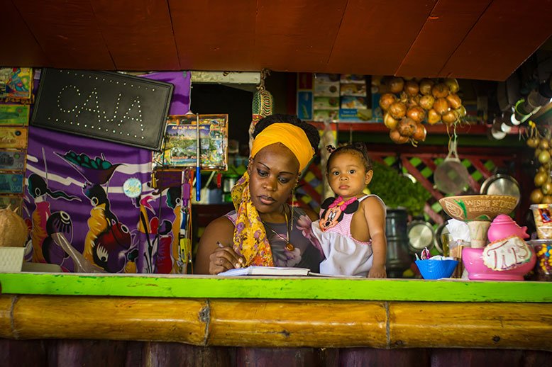 limon woman and baby inside of a store Costa Rica