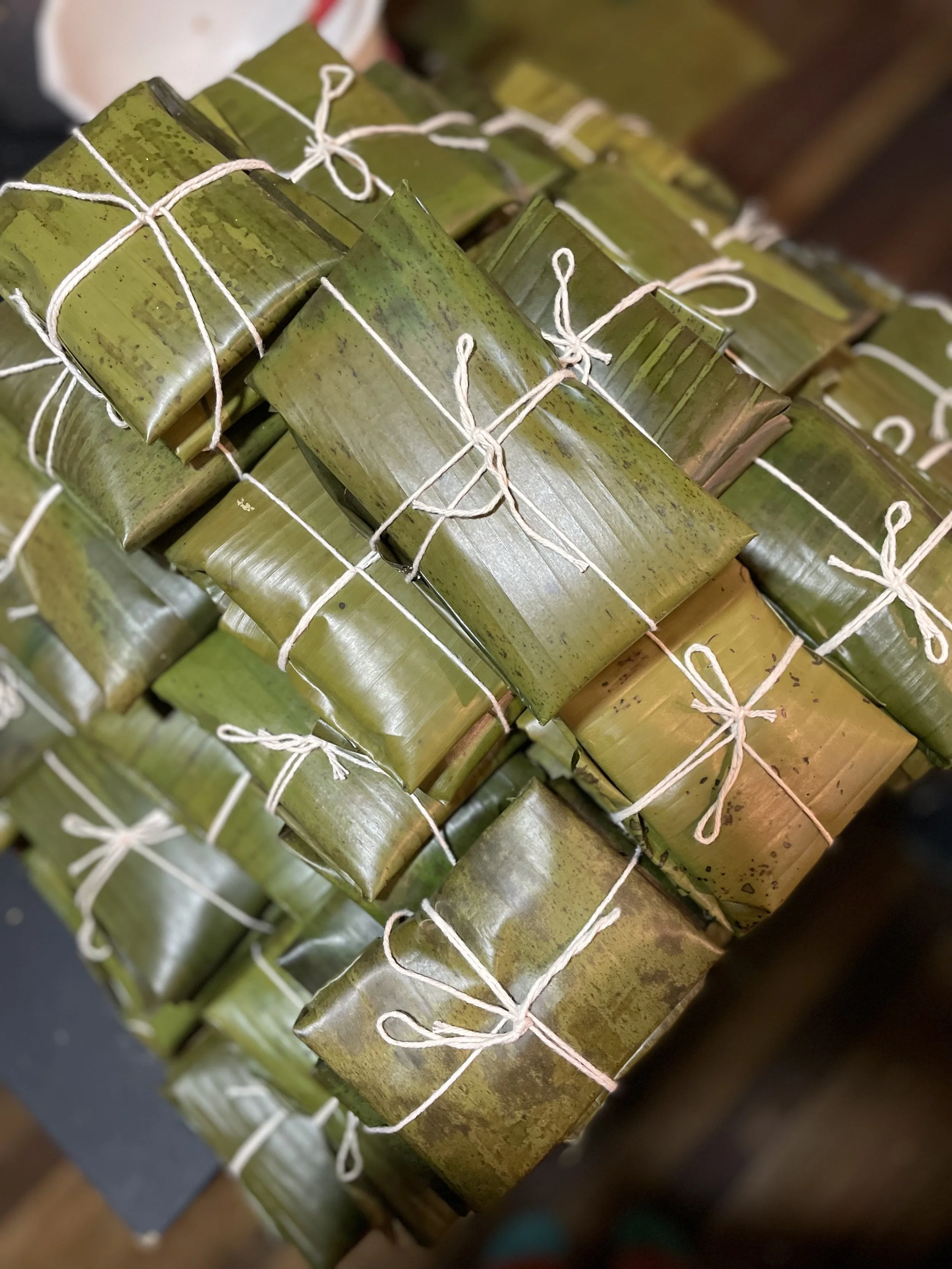 Tamales nicely wrapped in banana leaves make for the perfect afternoon snack.
