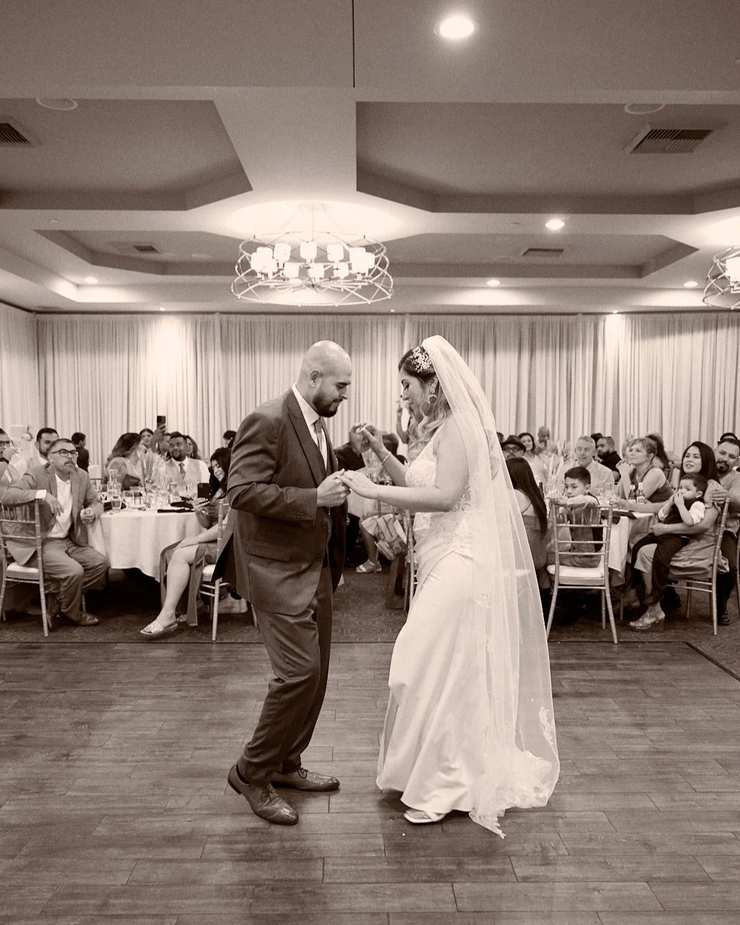 There is a quiet shift that happens about two hours into a wedding reception, right after the formal dinners are cleared and the music starts to carry through the room. It is the exact moment when the careful structure of the day melts away, and two 