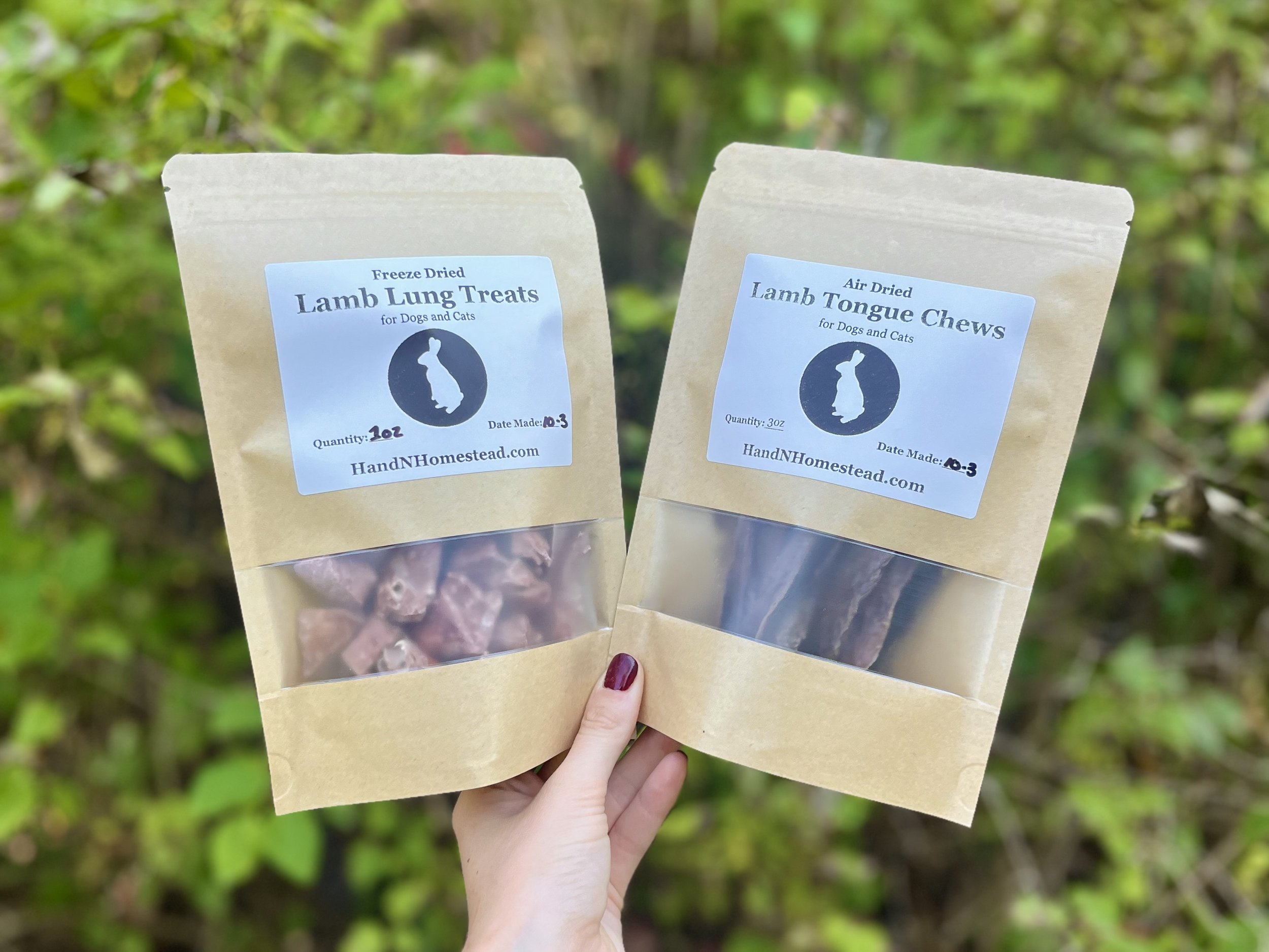 H&N Homestead owner holding bags of natural lamb dog chews