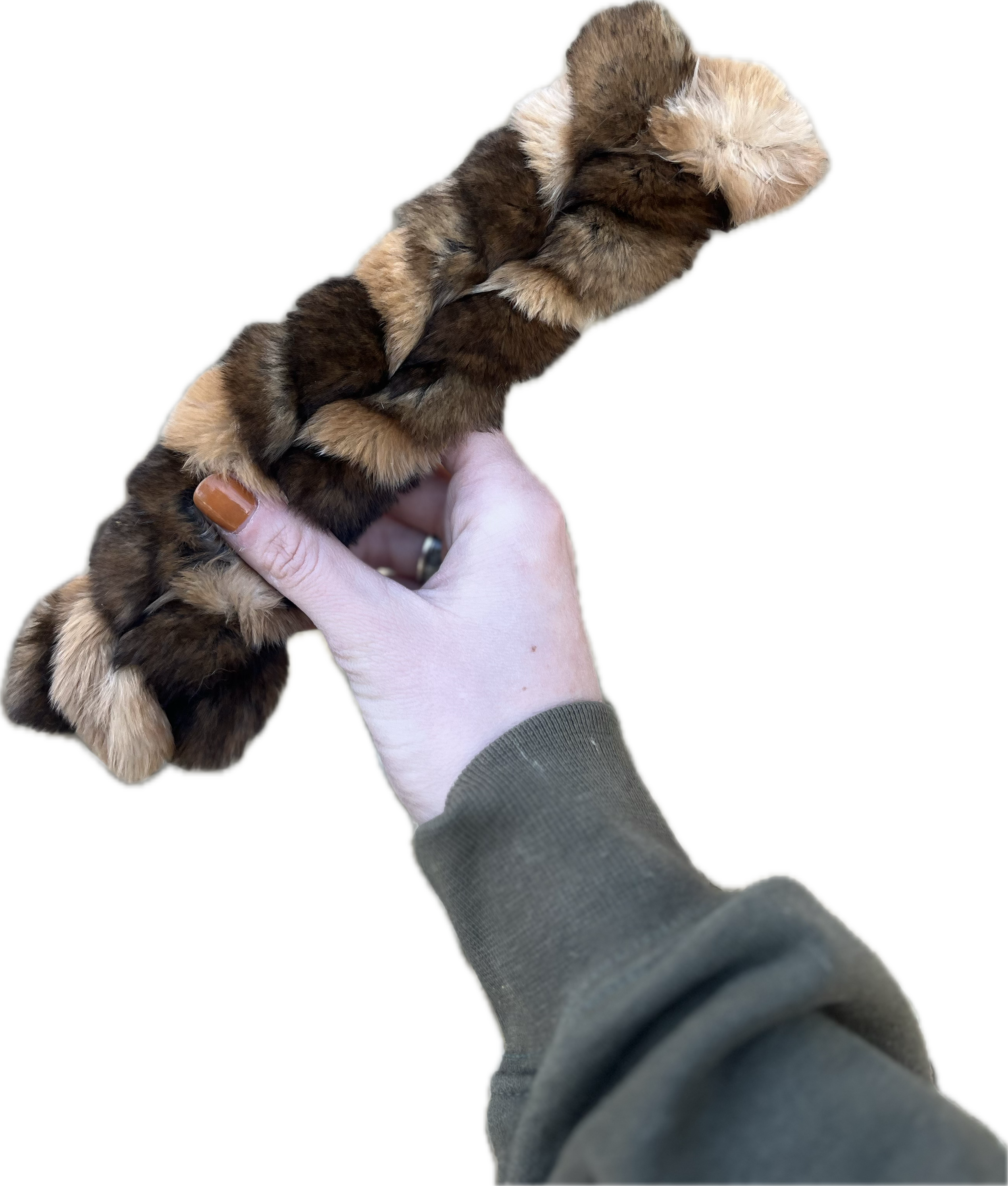 H&N Homestead owner holding a braided rabbit hide chew for dogs
