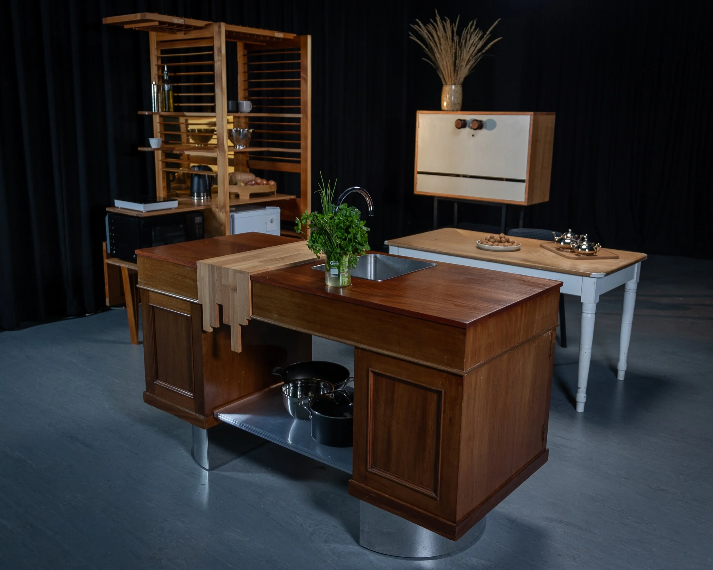 An experimental kitchen using four salvaged and transformed objects to test fundamental assumptions about what a kitchen actually requires. This research challenges conventional kitchen design by exploring minimum viable functionality.