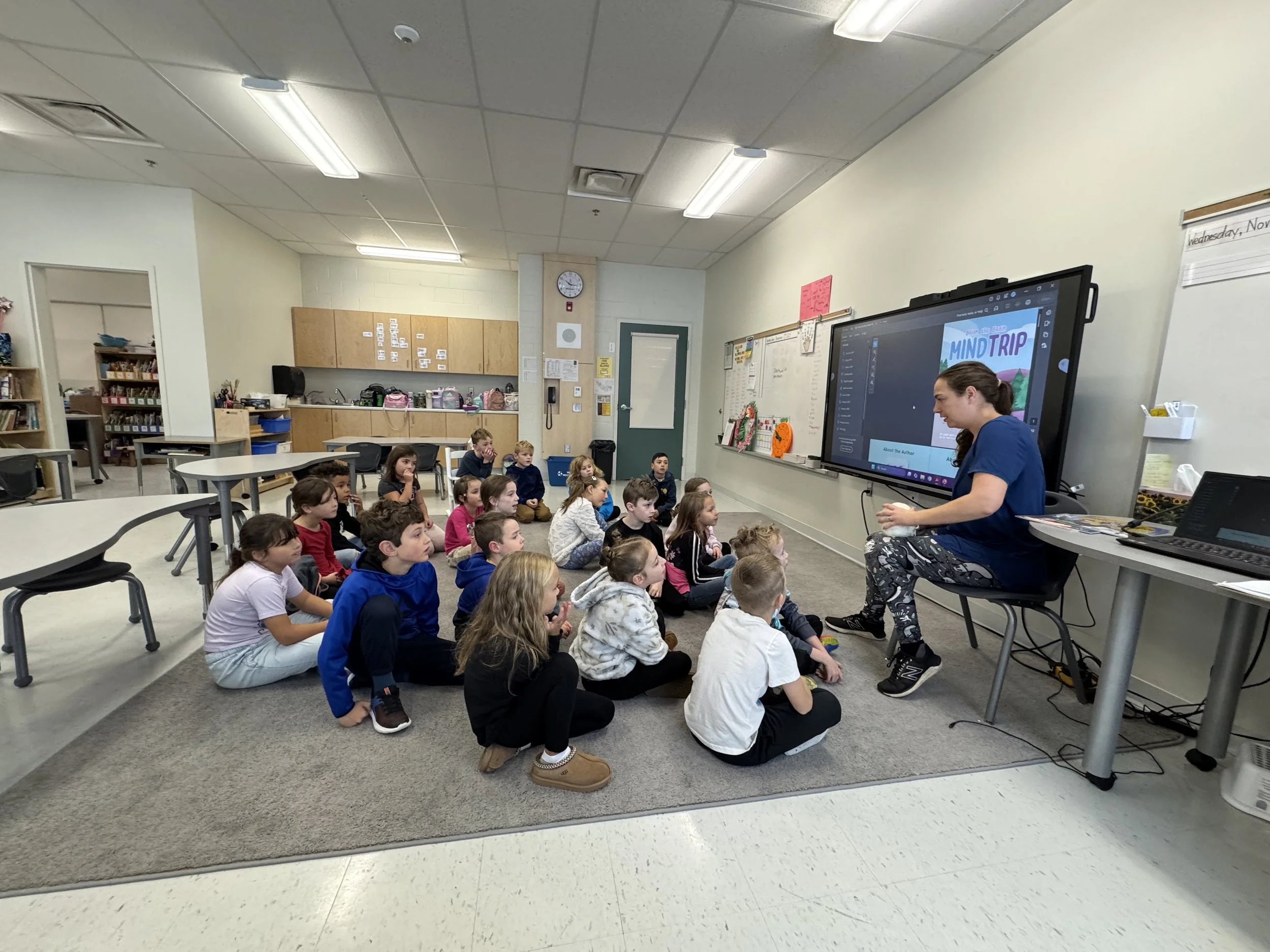 Students Engaged in Listening to Jenny Mouse's Class