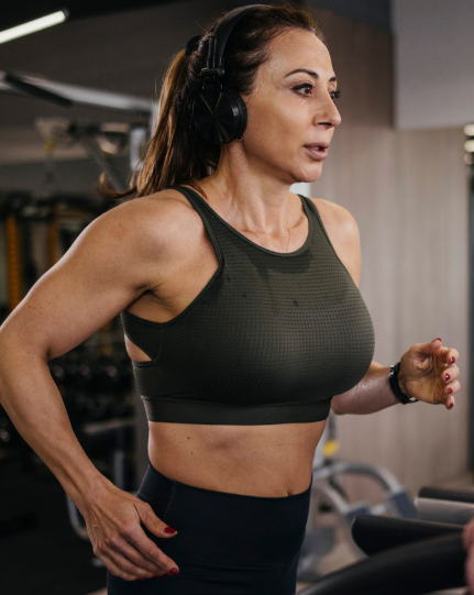 woman running on treadmill