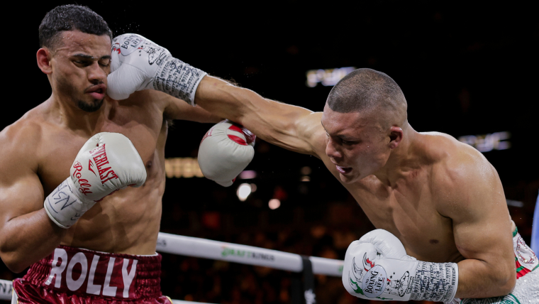 Isaac “Pitbull” Cruz KO’S Former Lightweight Champion Rolando Romero To Win Title