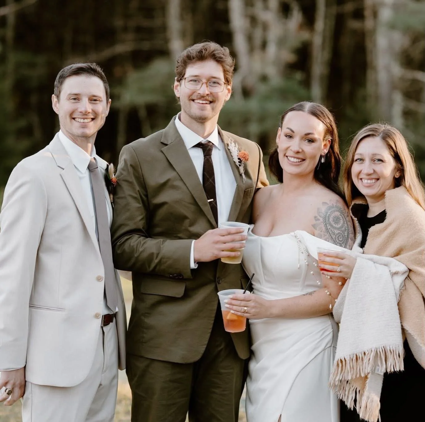 Good friends enjoying a beautiful fall wedding.