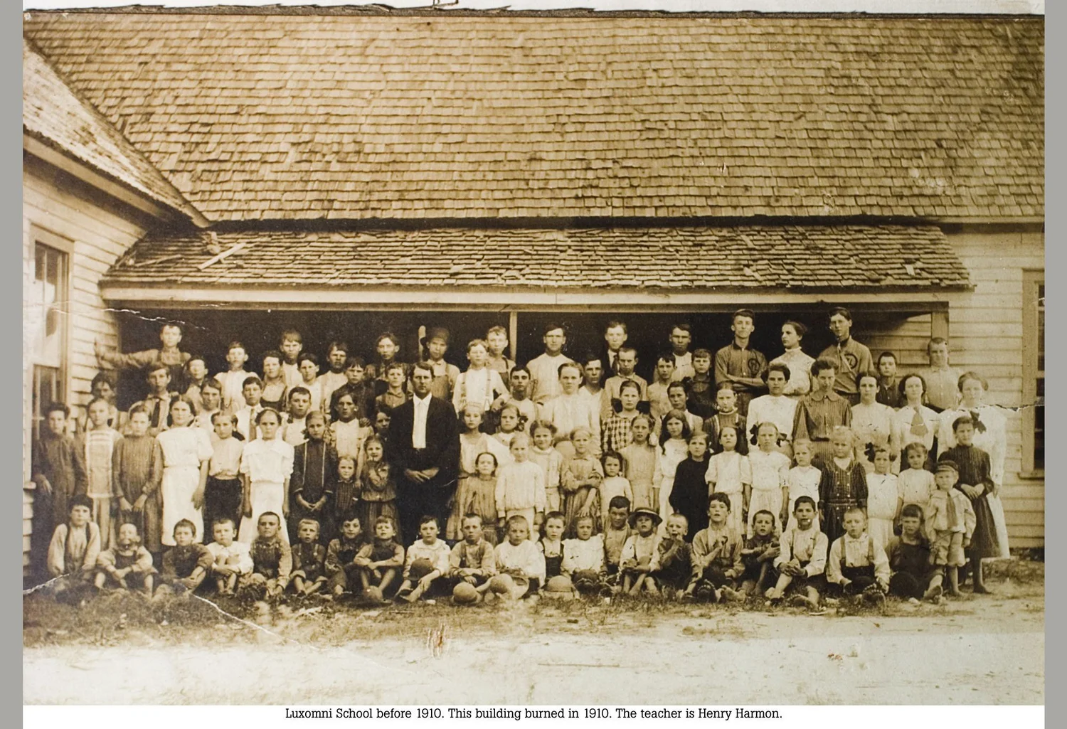 Students and teacher gathered outside Luxomni School before 1910.
