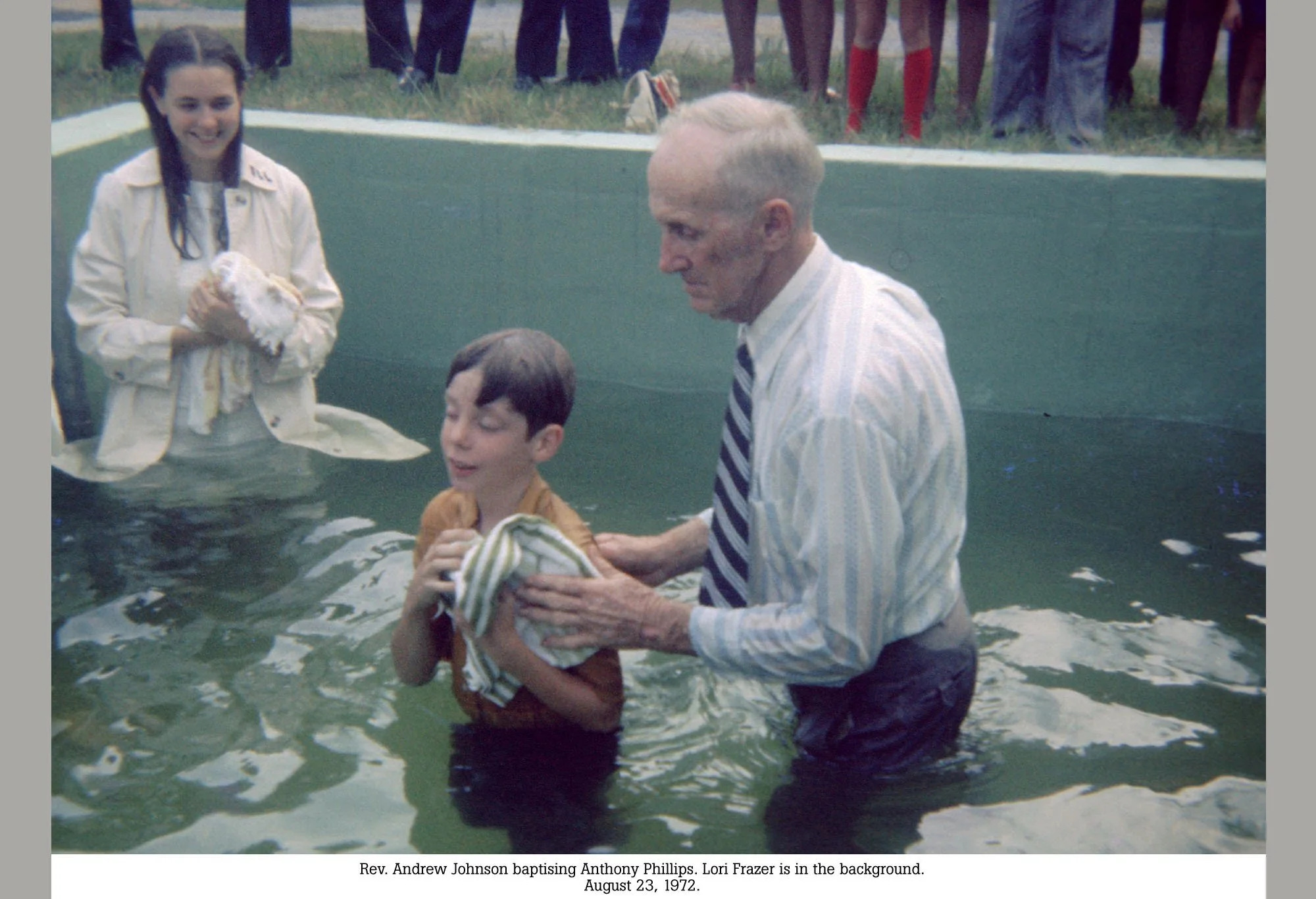 Rev. Andrew Johnson baptizing Anthony Phillips in 1972
