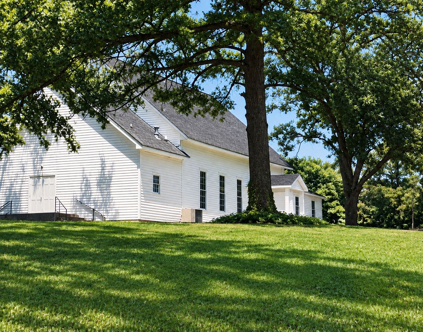 Historic white Luxomni Church building