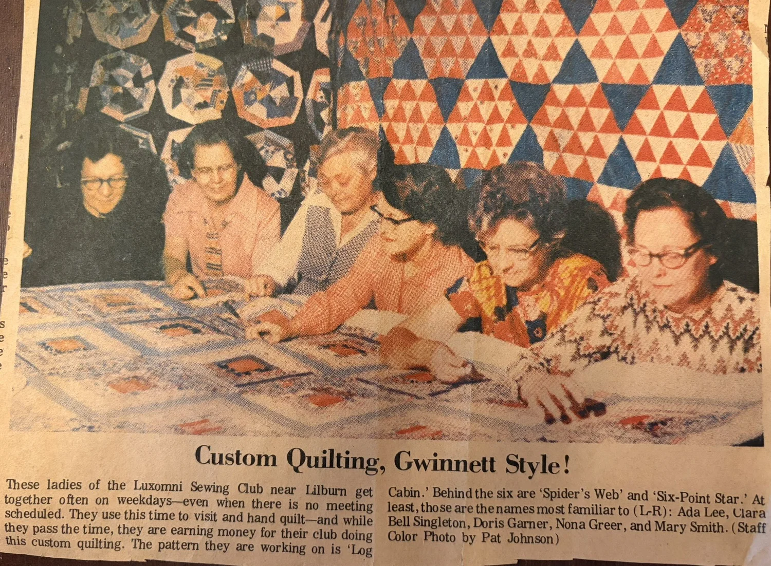Historic newspaper clipping showing members of the Luxomni Sewing Club hand quilting together.