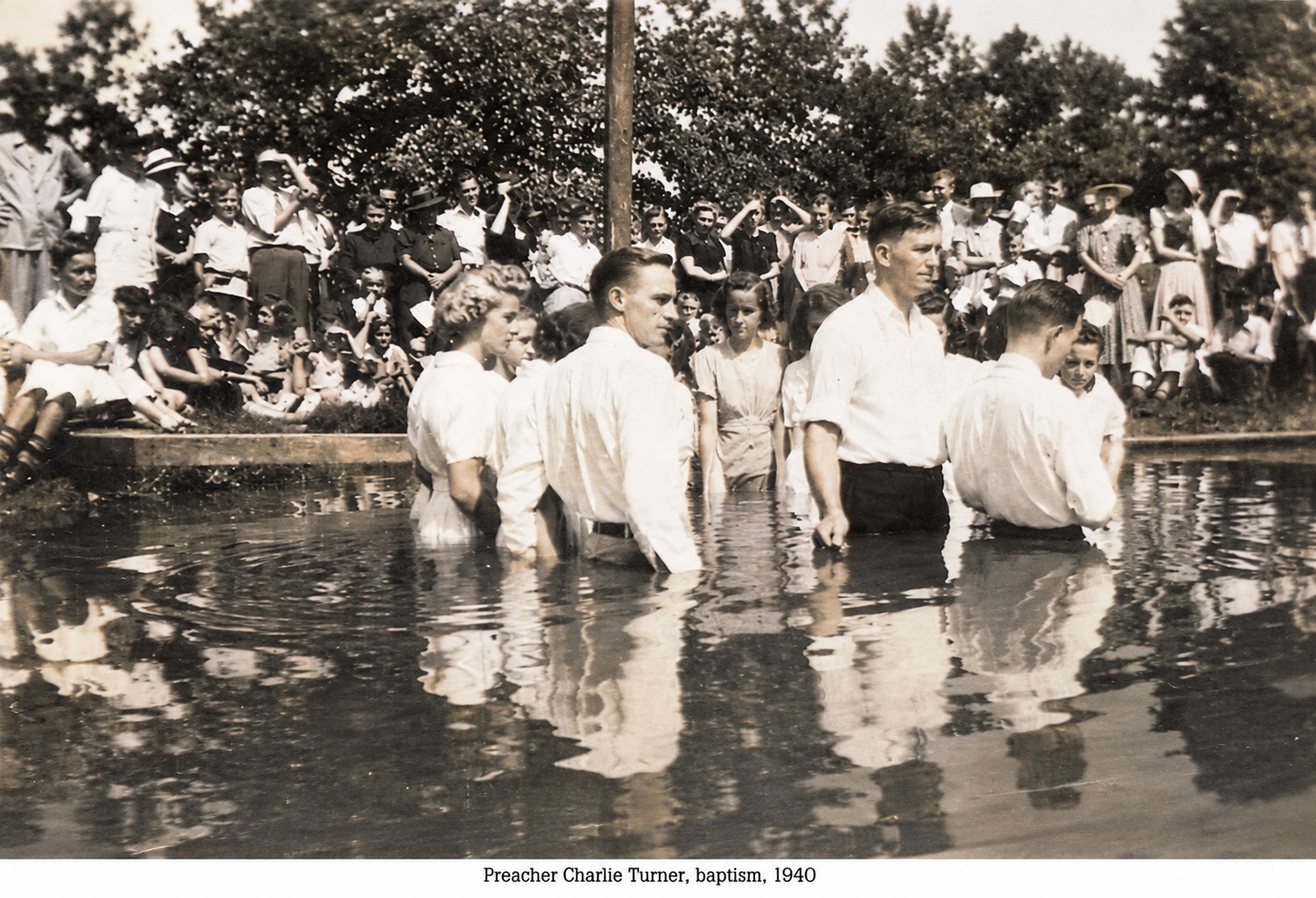 Preacher Charlie Turner conducting a Luxomni baptism in 1940