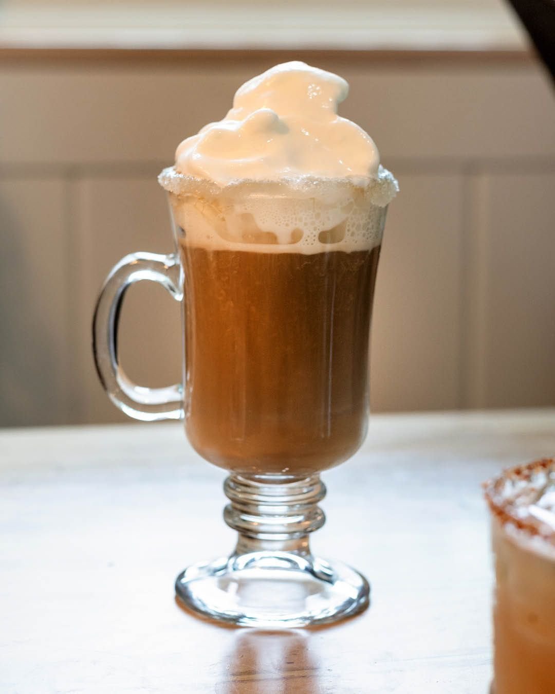 Three delicious beverages, all equally autumnal. 🍂

Warm up your chilly days with a rich Classic Specialty Coffee crowned with a cloud of whipped cream; complement the crisp air with The Swing Bridge, a delightful mocktail inspired by an apple Amare