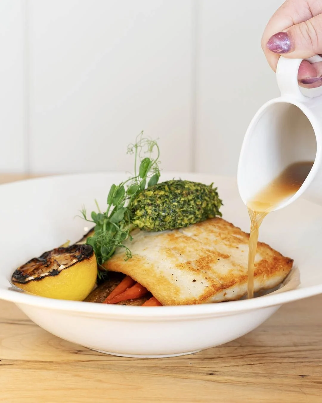 Our Halibut with Pistachio Gremolata is light, flavourful and perfect for brightening a dreary day in Muskoka. 🌱

We pan-sear the delicate, flaky halibut to give it a golden crust, then top it with a vibrant pistachio gremolata for a subtle crunch. 